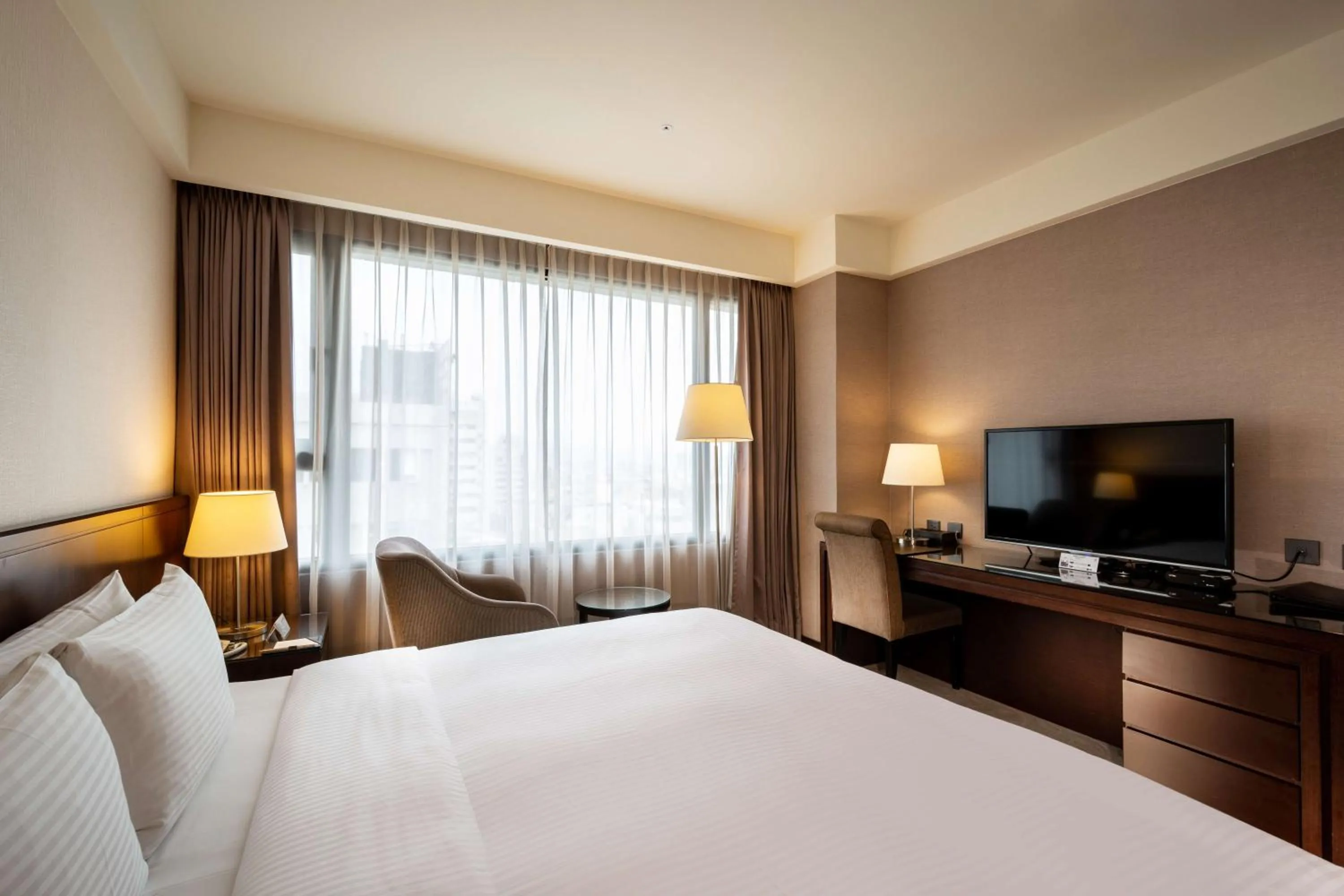 Photo of the whole room, Bed in 雀客旅館台中來來