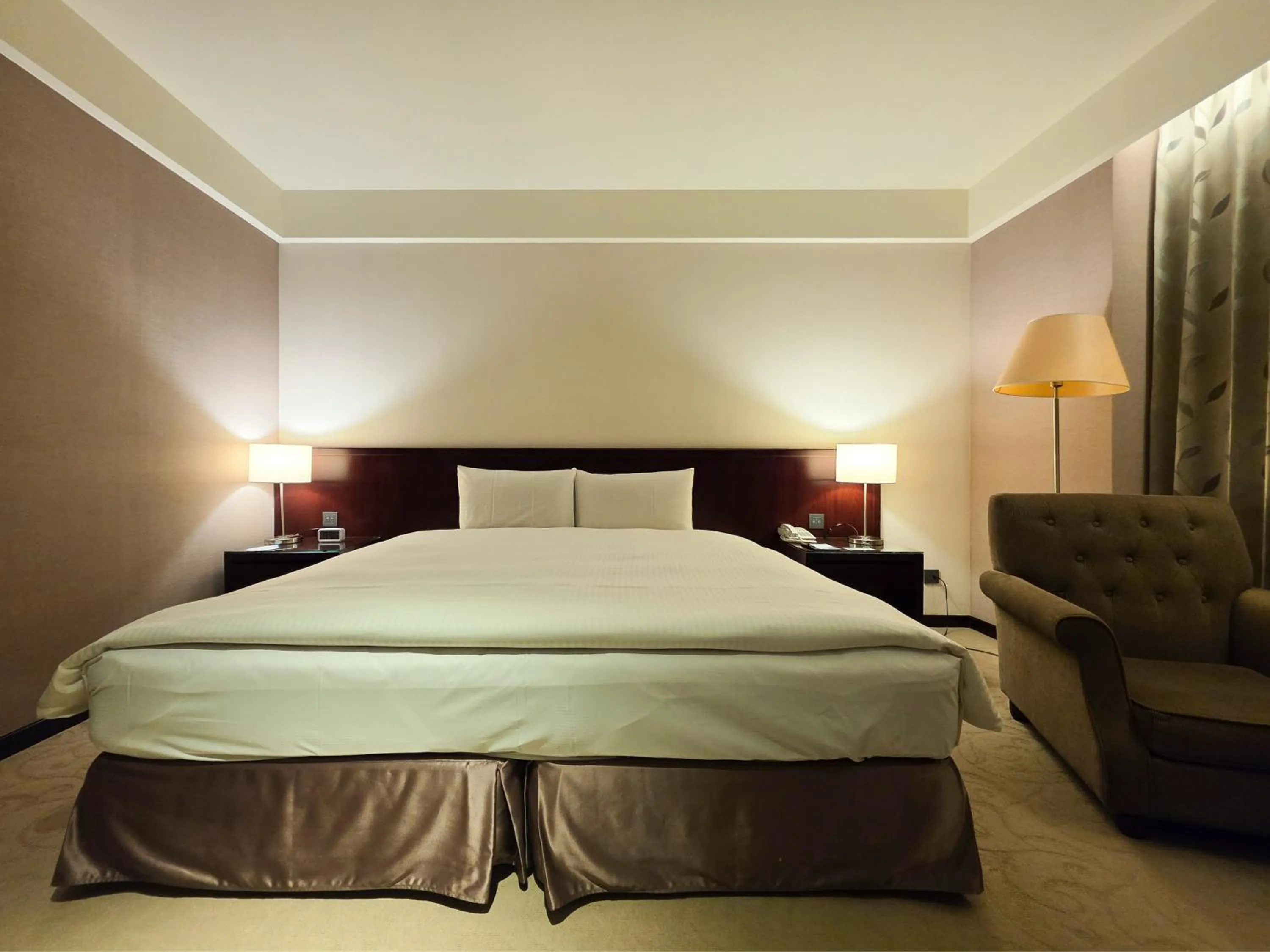 Bed in 雀客旅館台中來來