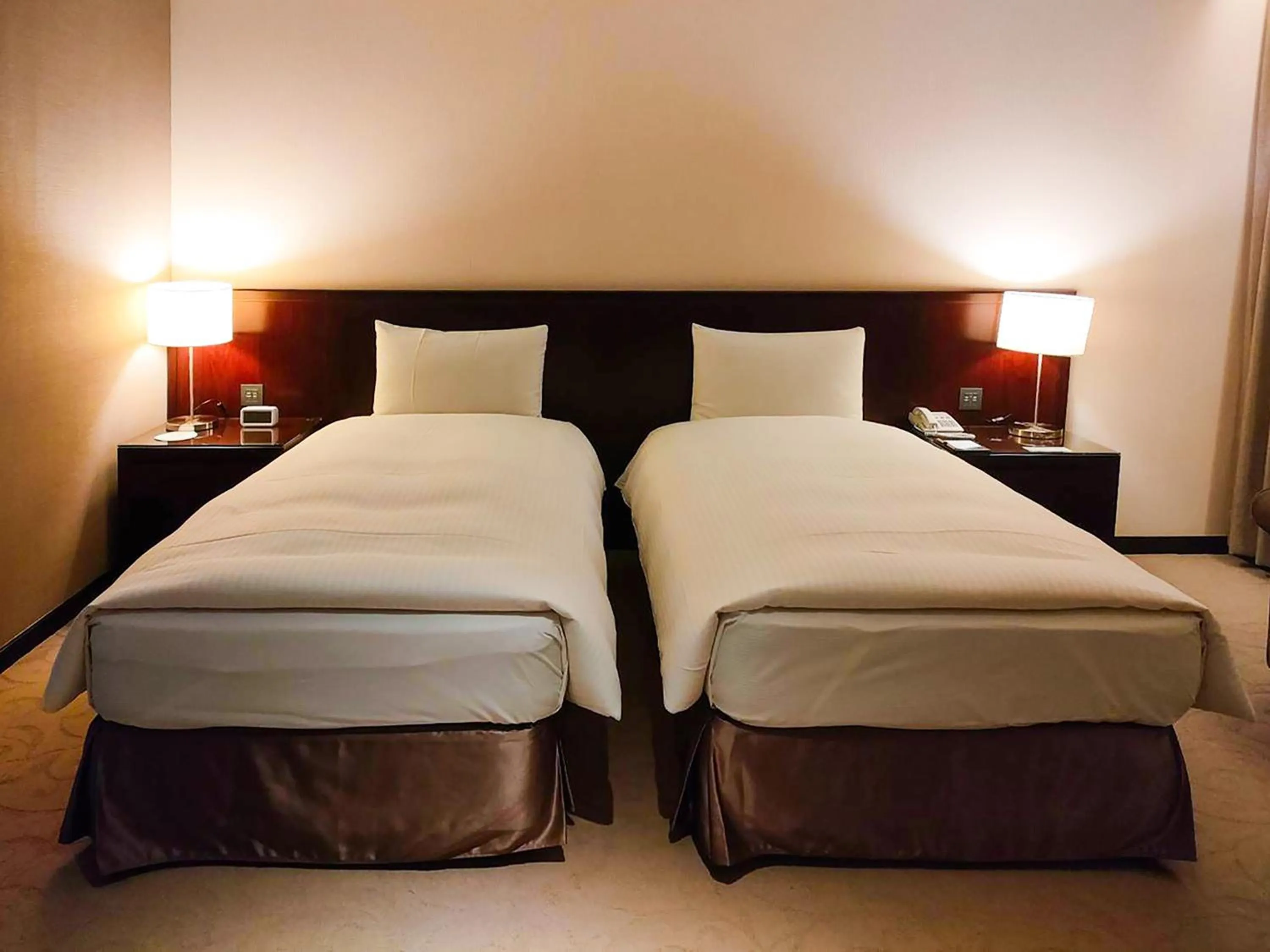 Bed in 雀客旅館台中來來