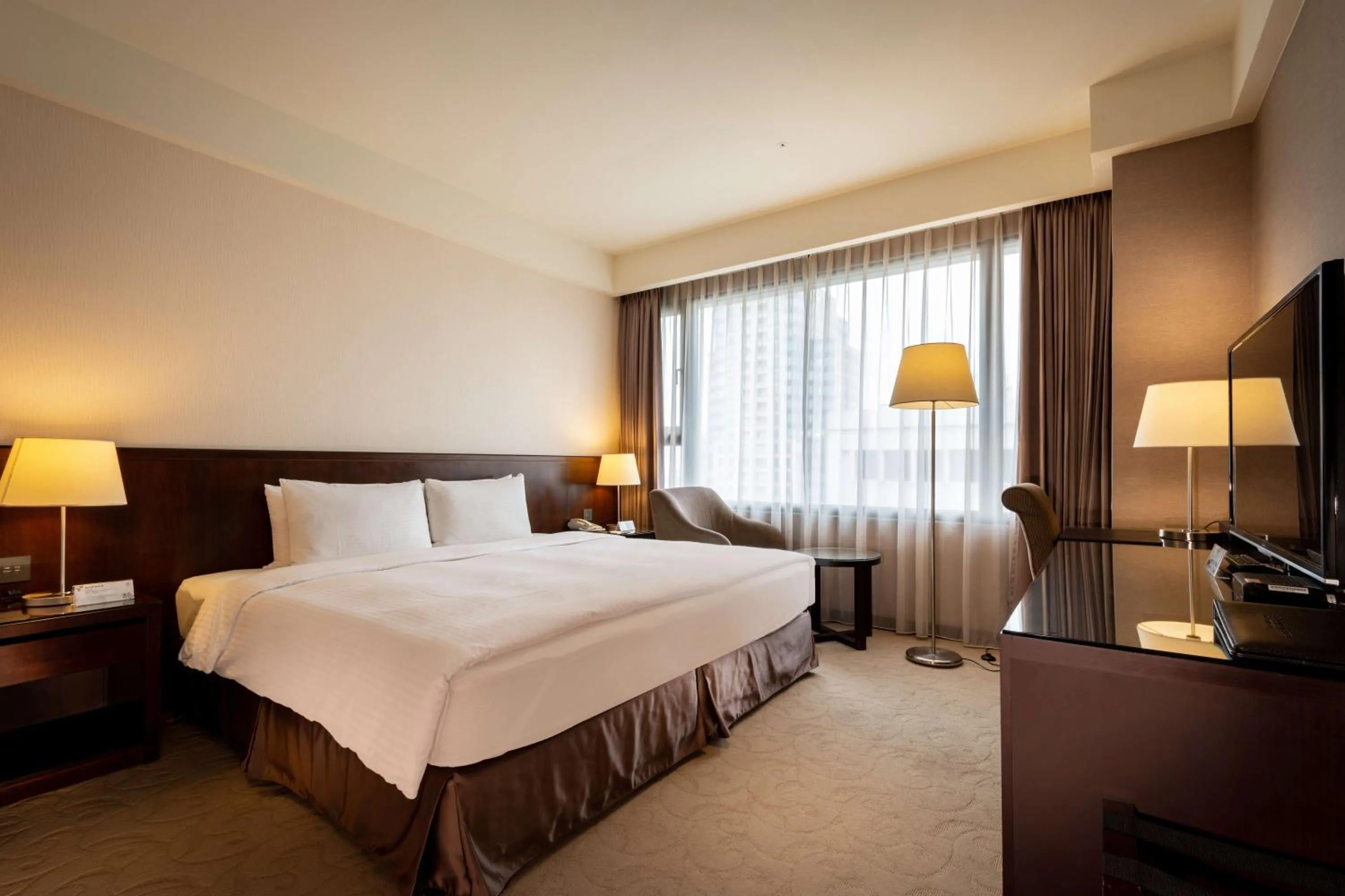 Bed in 雀客旅館台中來來