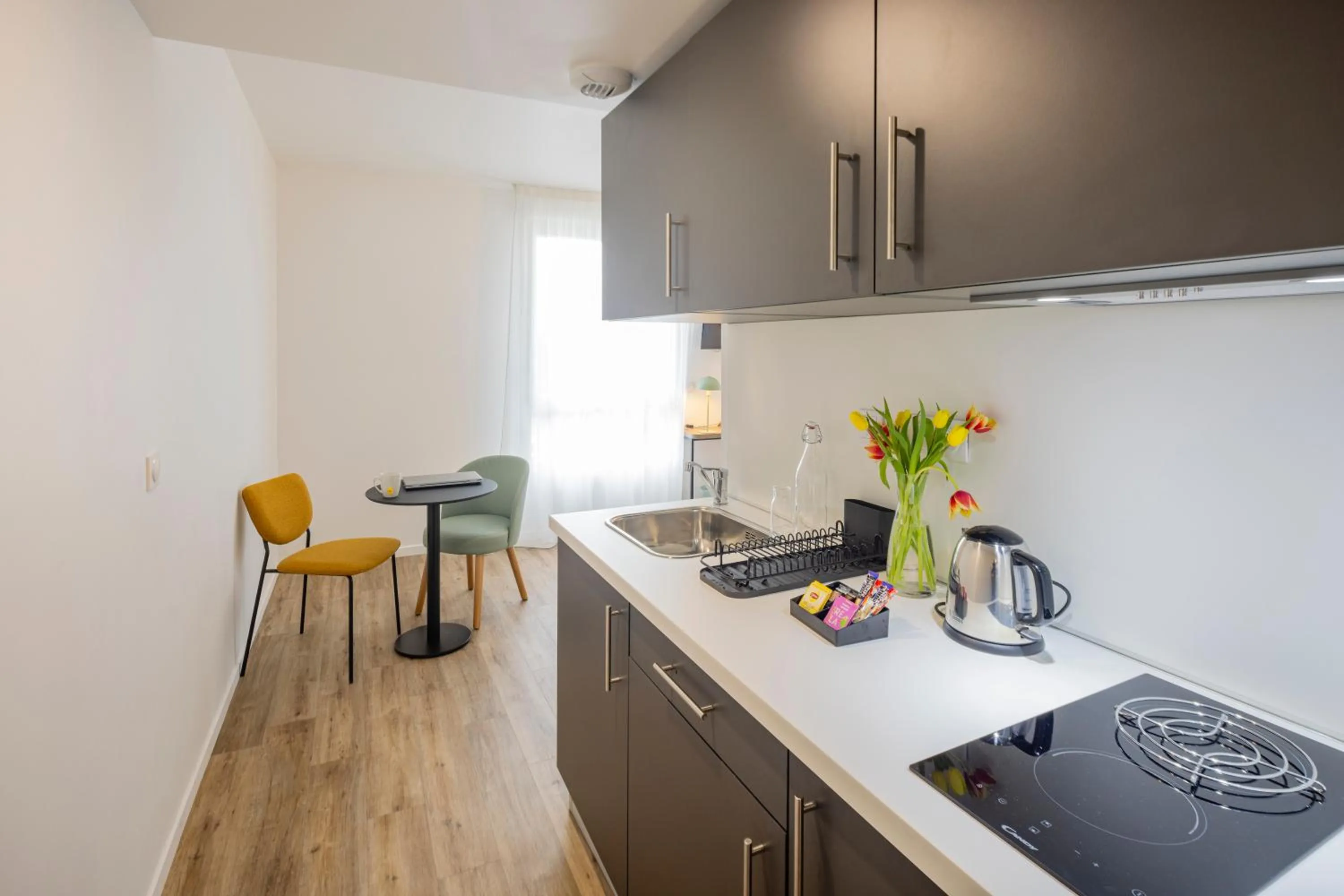 Kitchen or kitchenette in All Suites Appart Hôtel - Le Havre Centre - Les docks