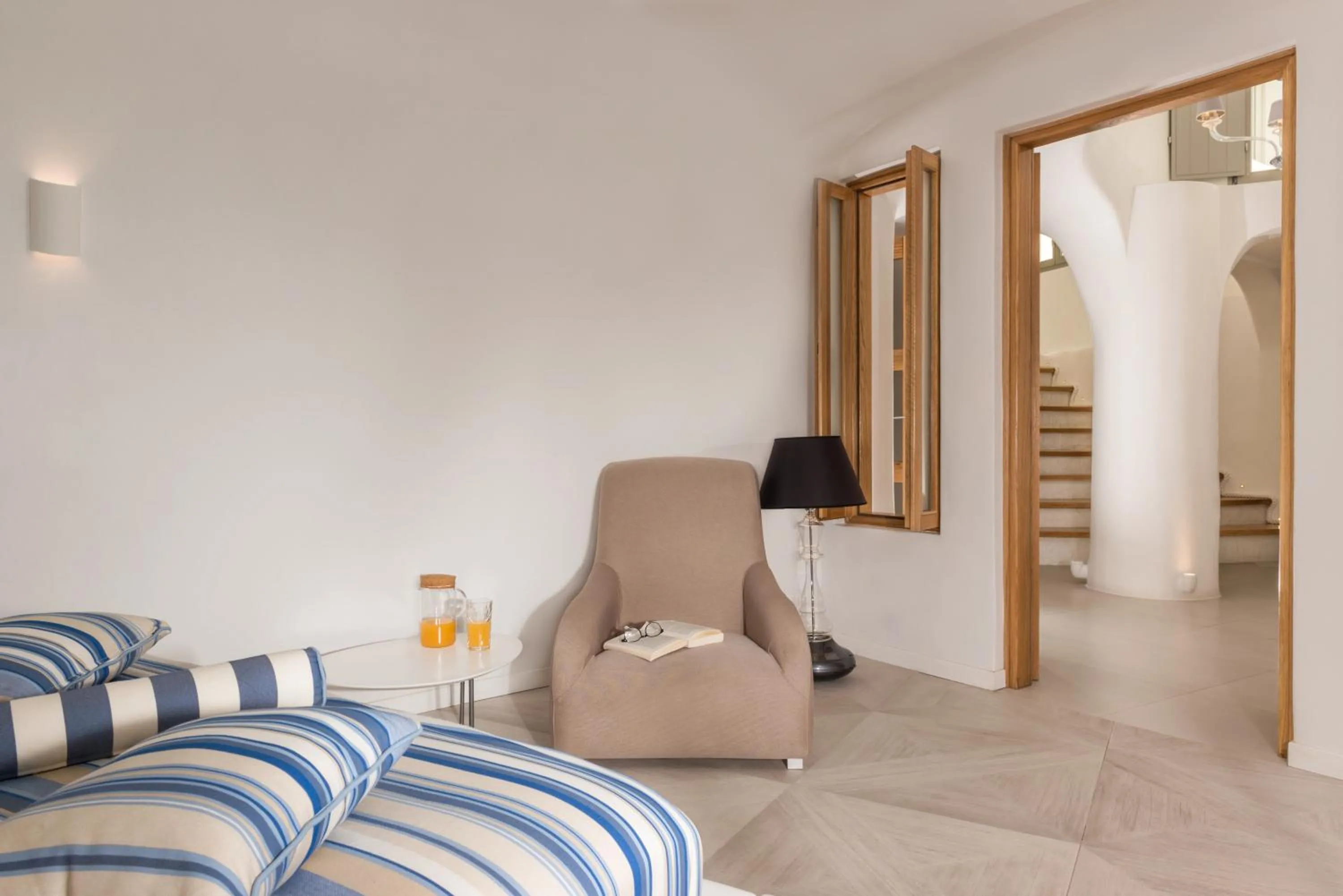 Seating area in Elite Luxury Suites