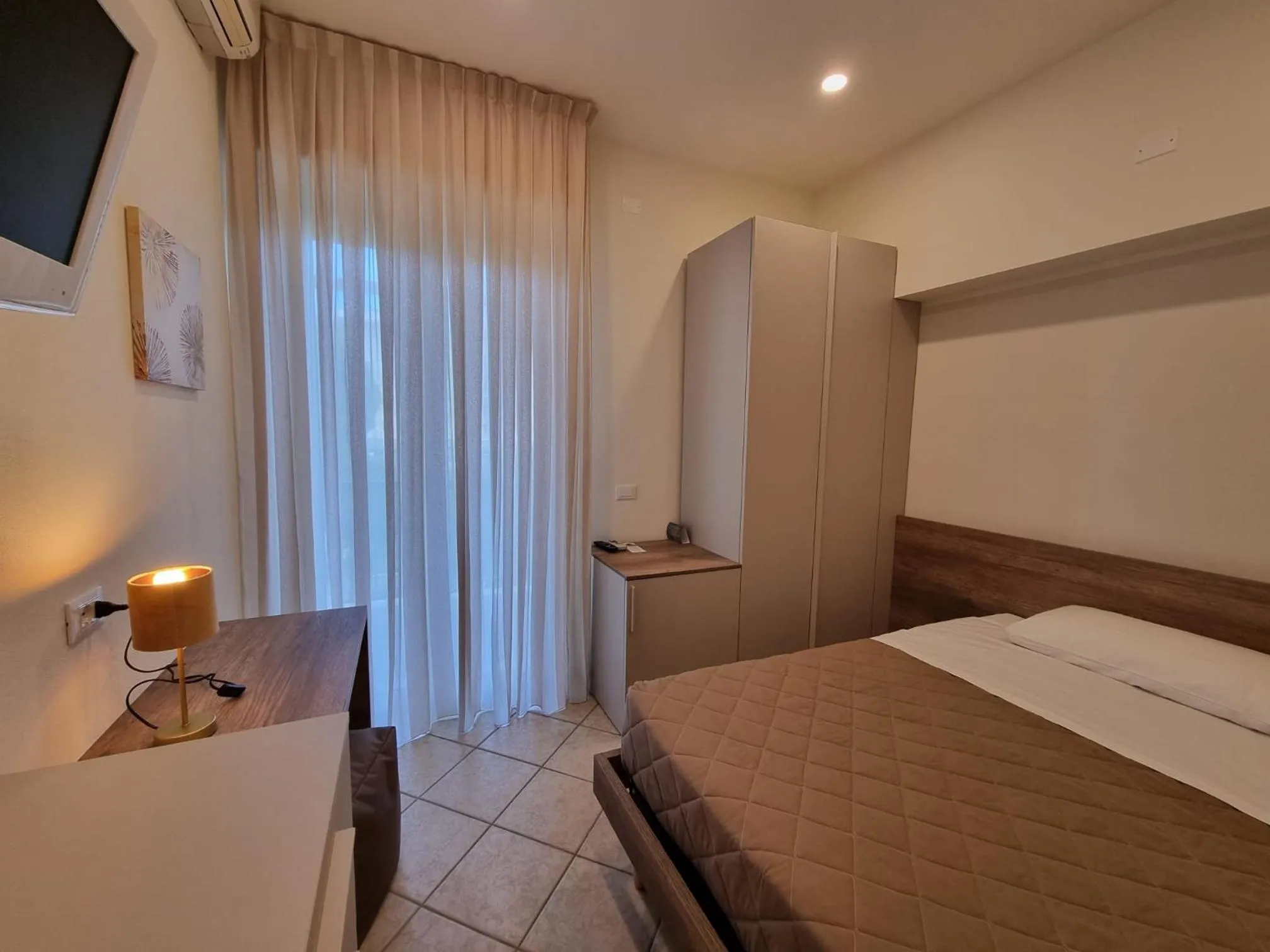 Balcony/Terrace, Bed in Hotel Parco