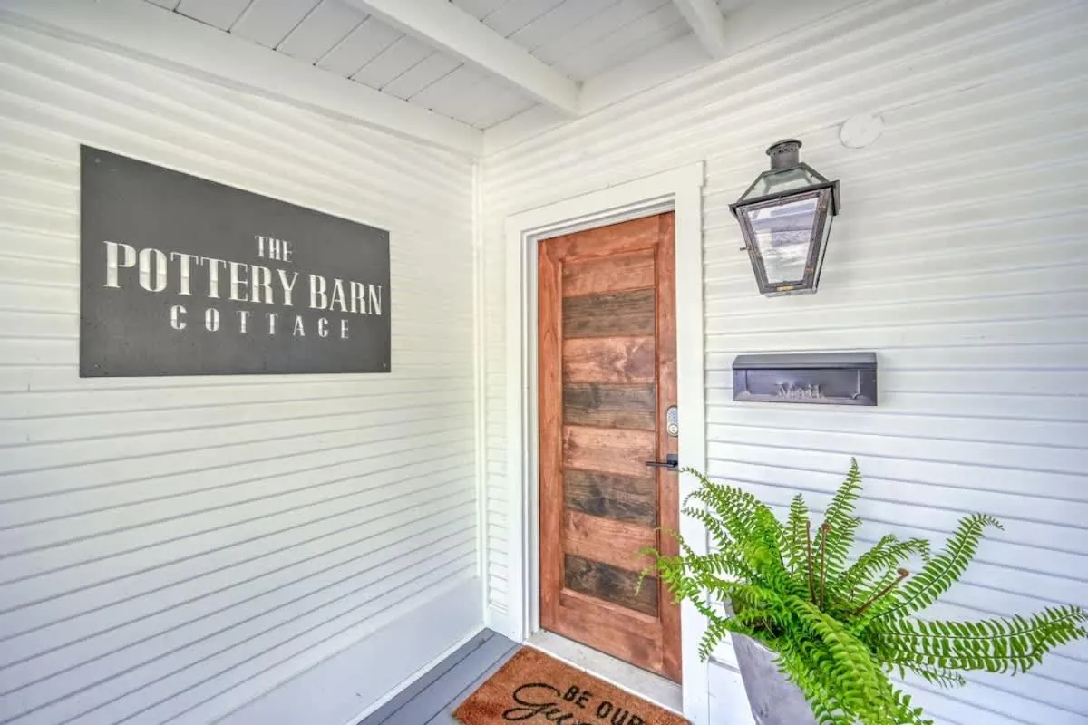 Property logo or sign in Charming Cottage Near Main with Patio&FirePit!!