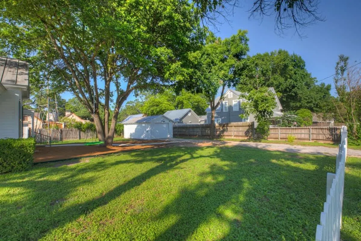 Property building in Stunning Home with Hot Tub & Grill Just 2 Blks from Main St!