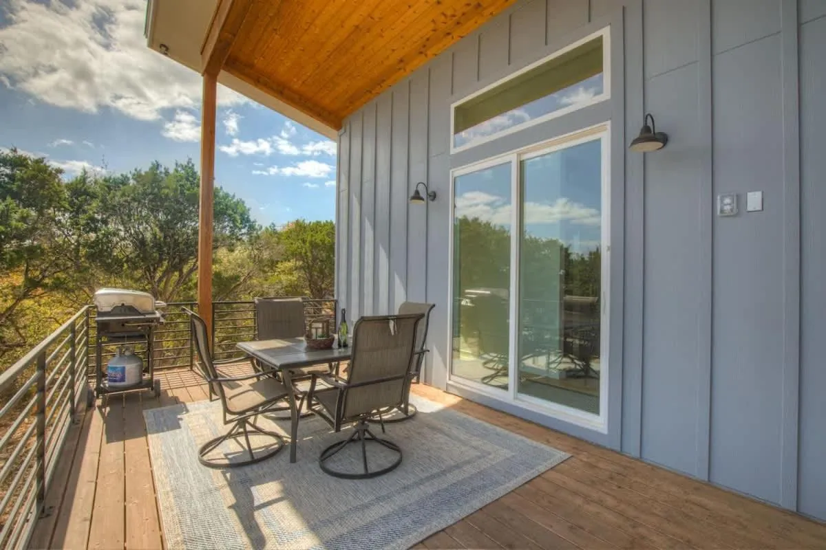 Patio in Stunning Lake Home with Pool-Beach-Gym-Boat Access