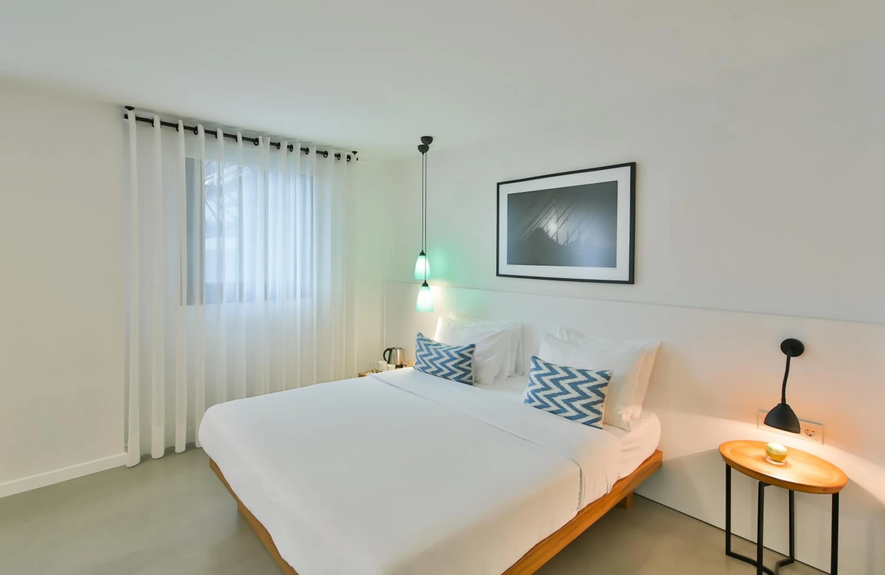 Bed in Alilass Hotel