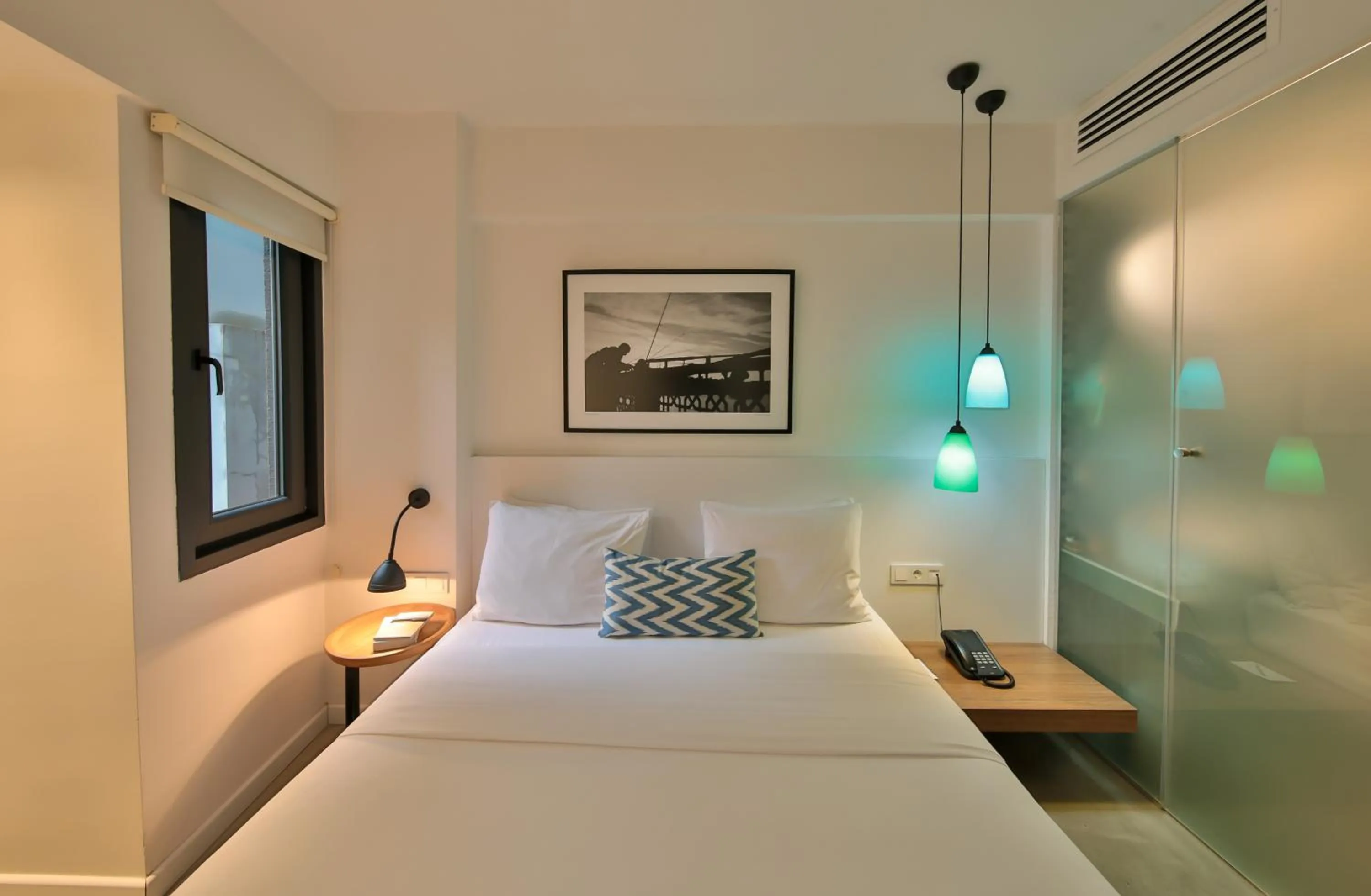 Bed in Alilass Hotel