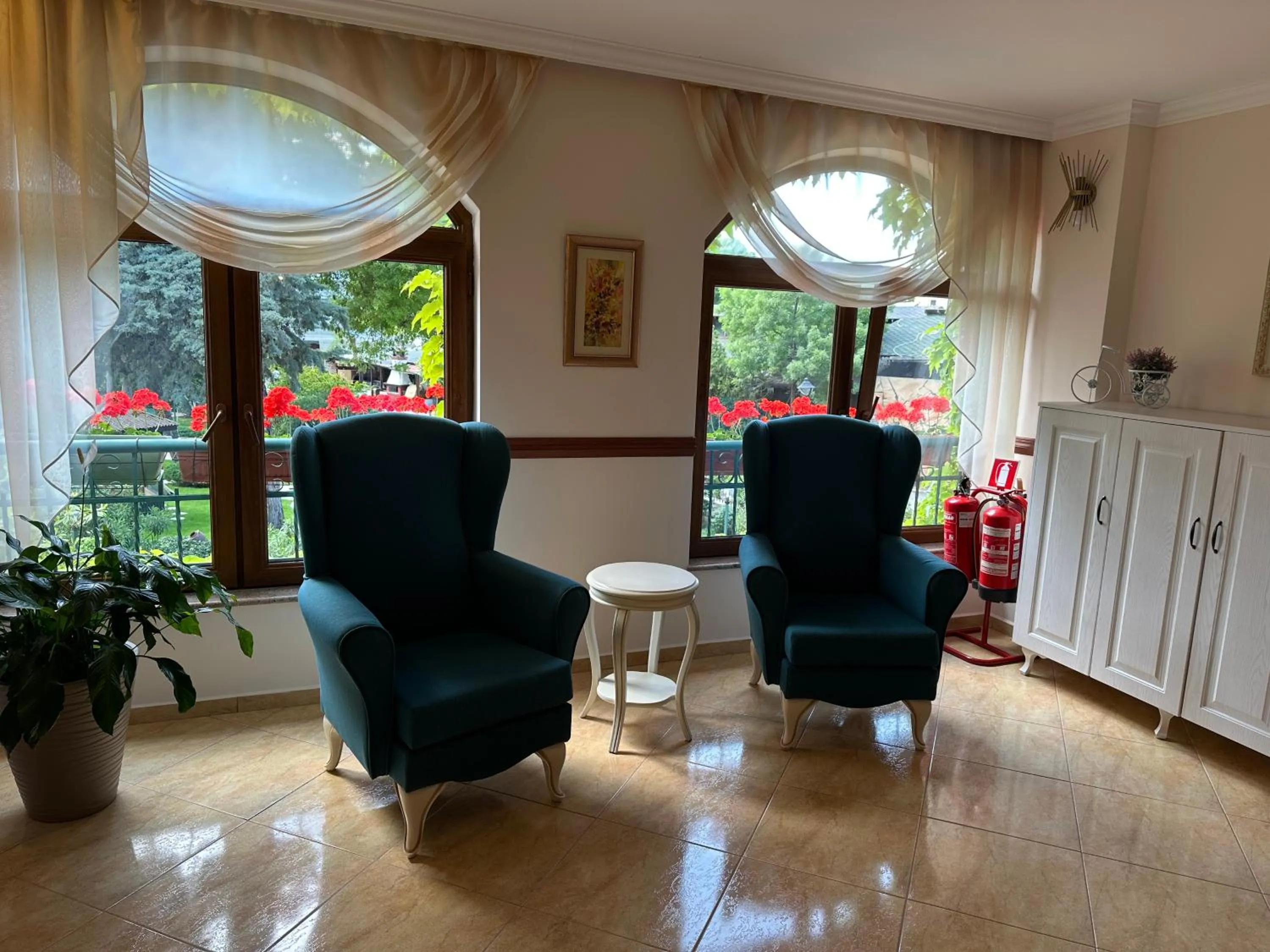 Seating area in Oleander House and Tennis Club