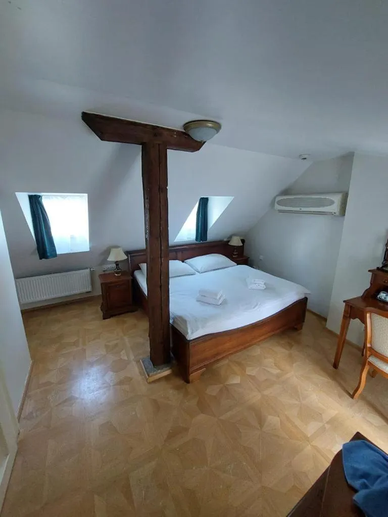 Bed in River View Residence by Charles Bridge