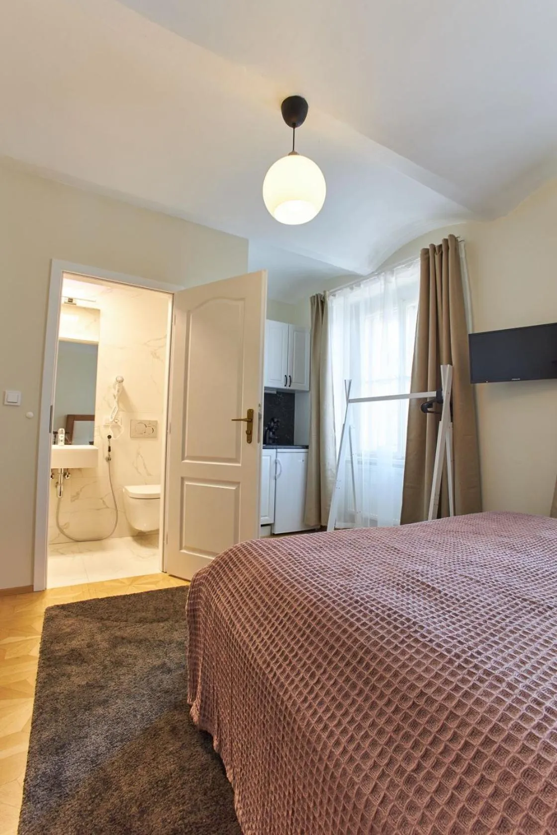 Bed in River View Residence by Charles Bridge