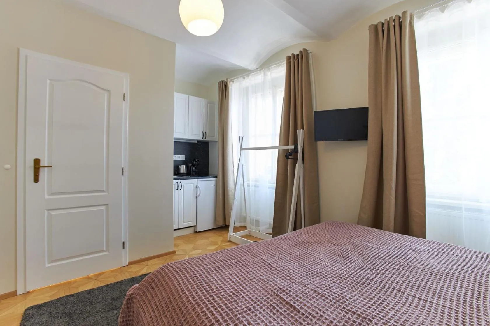 Bed in River View Residence by Charles Bridge