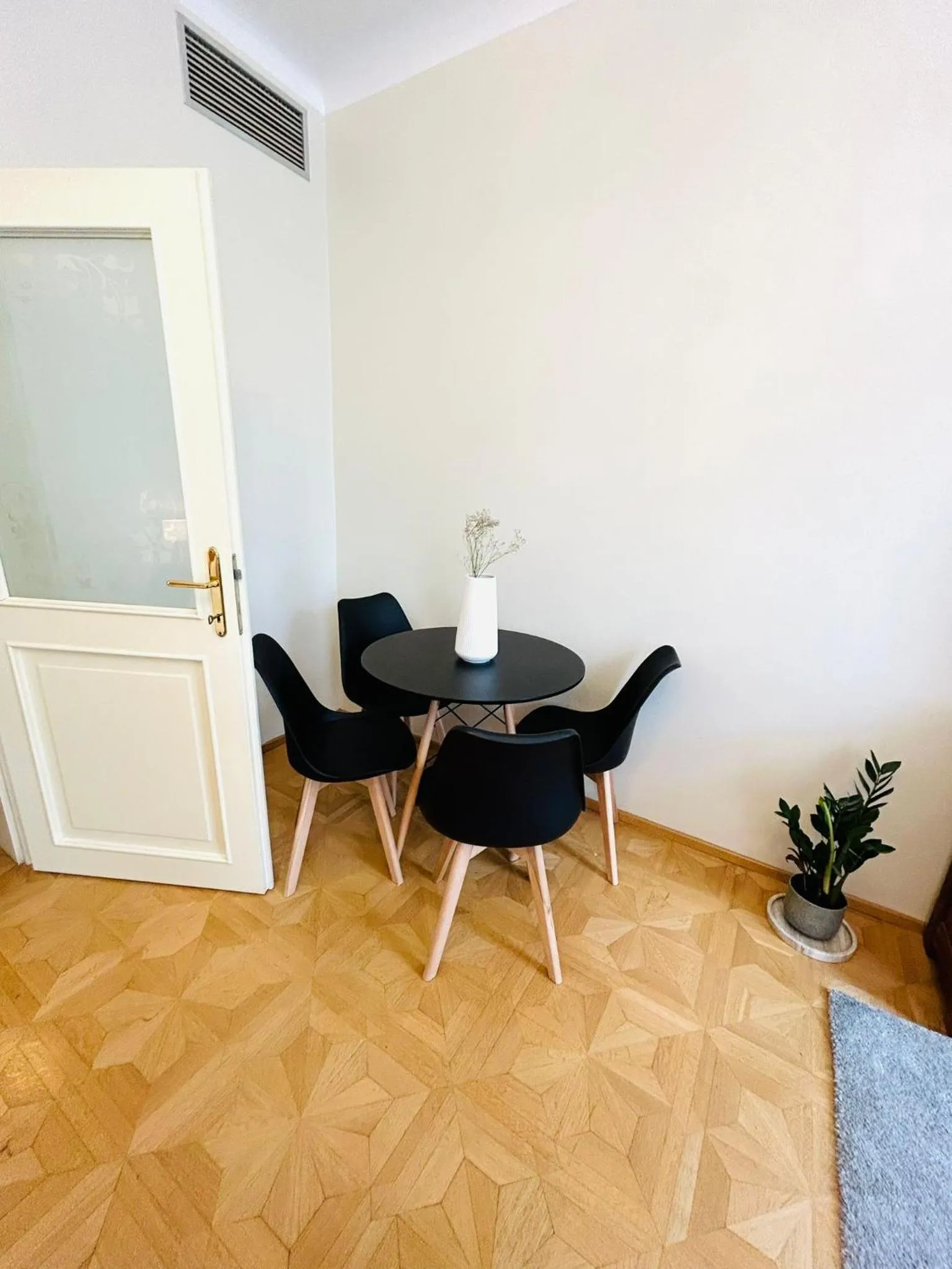 Dining area in River View Residence by Charles Bridge