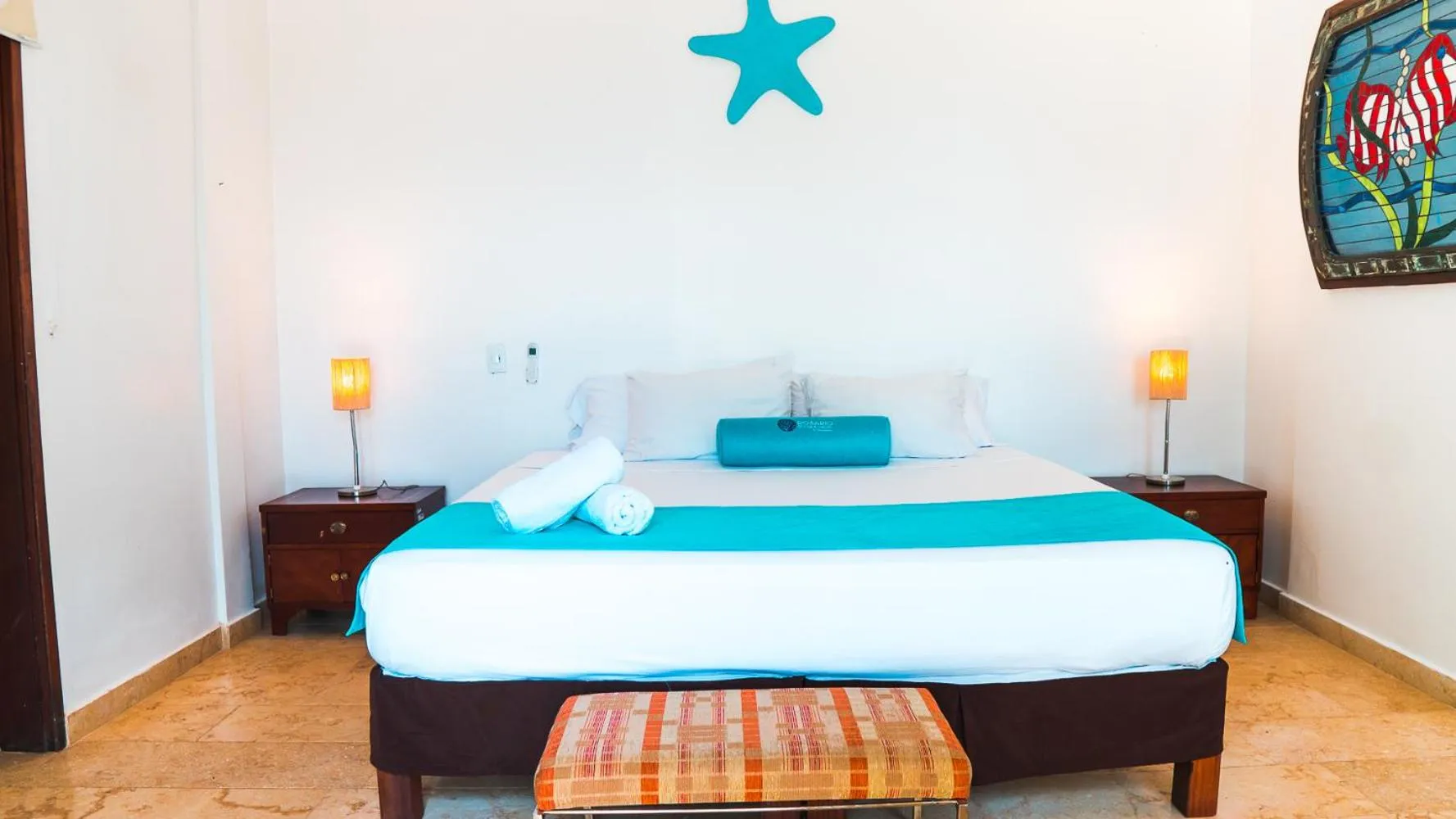 Bed in Hotel Rosario de Mar by Tequendama