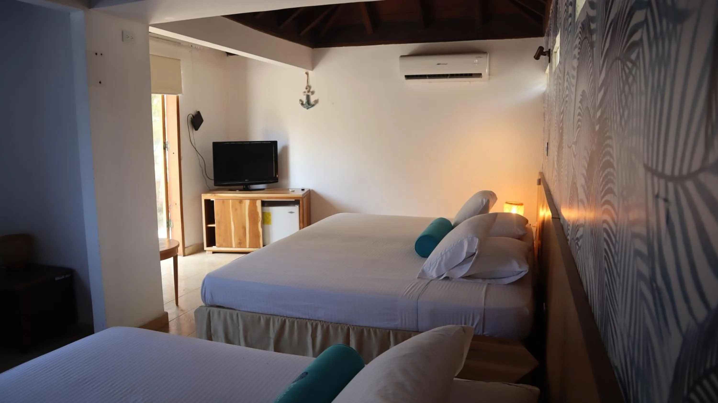 Bed in Hotel Rosario de Mar by Tequendama