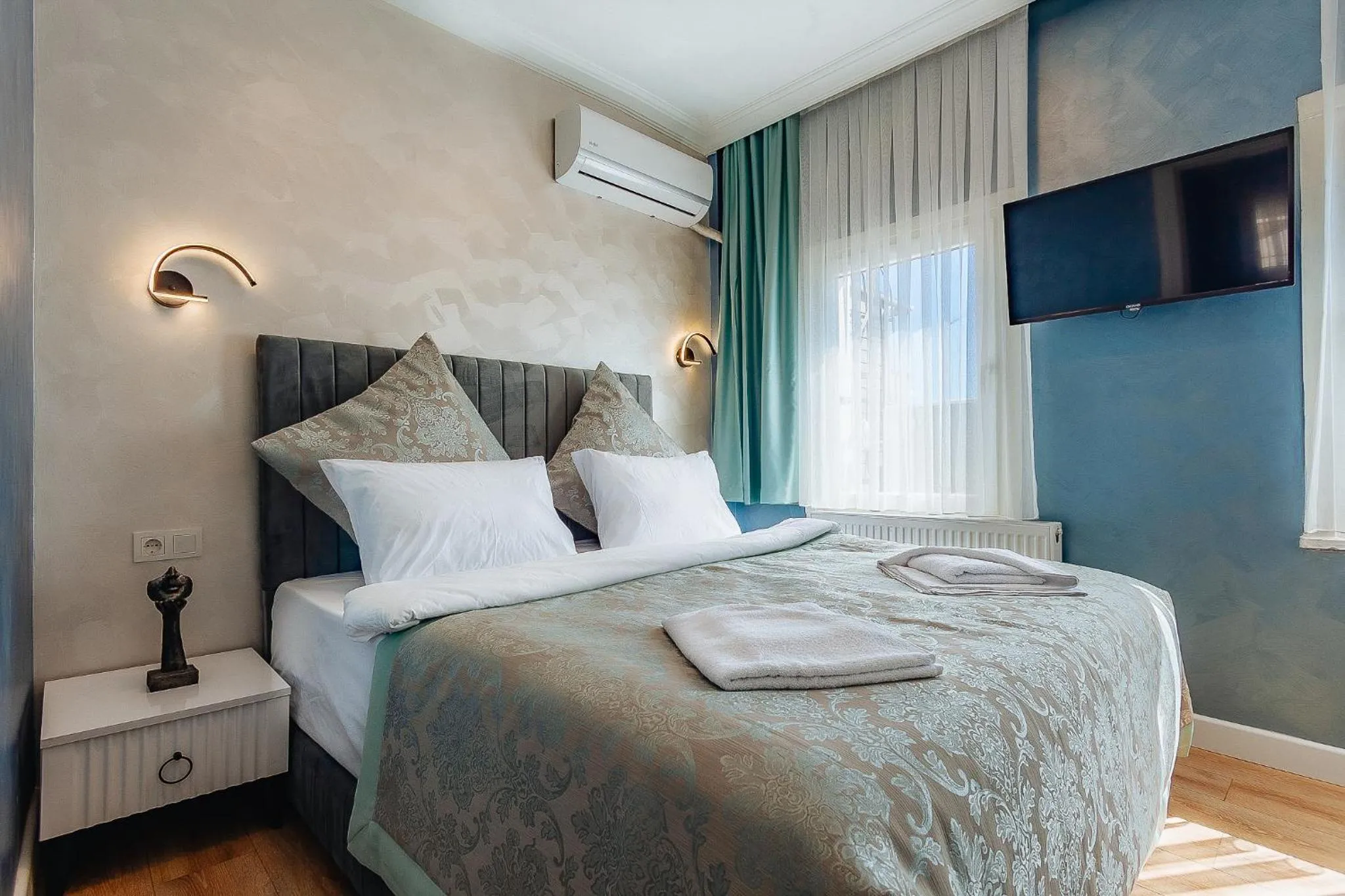 Bed in Taksim Bi Center Suites