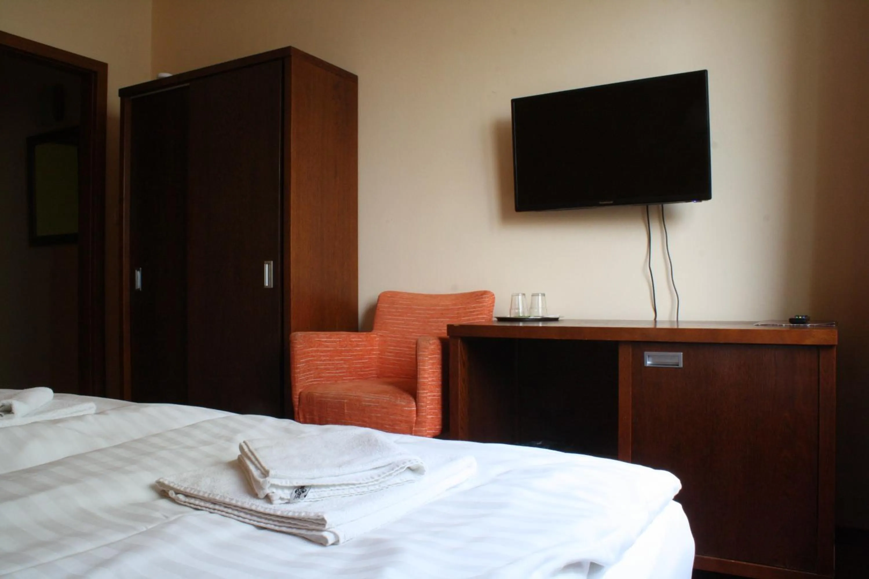 Bed in Garni Hotel Cosmopolitan