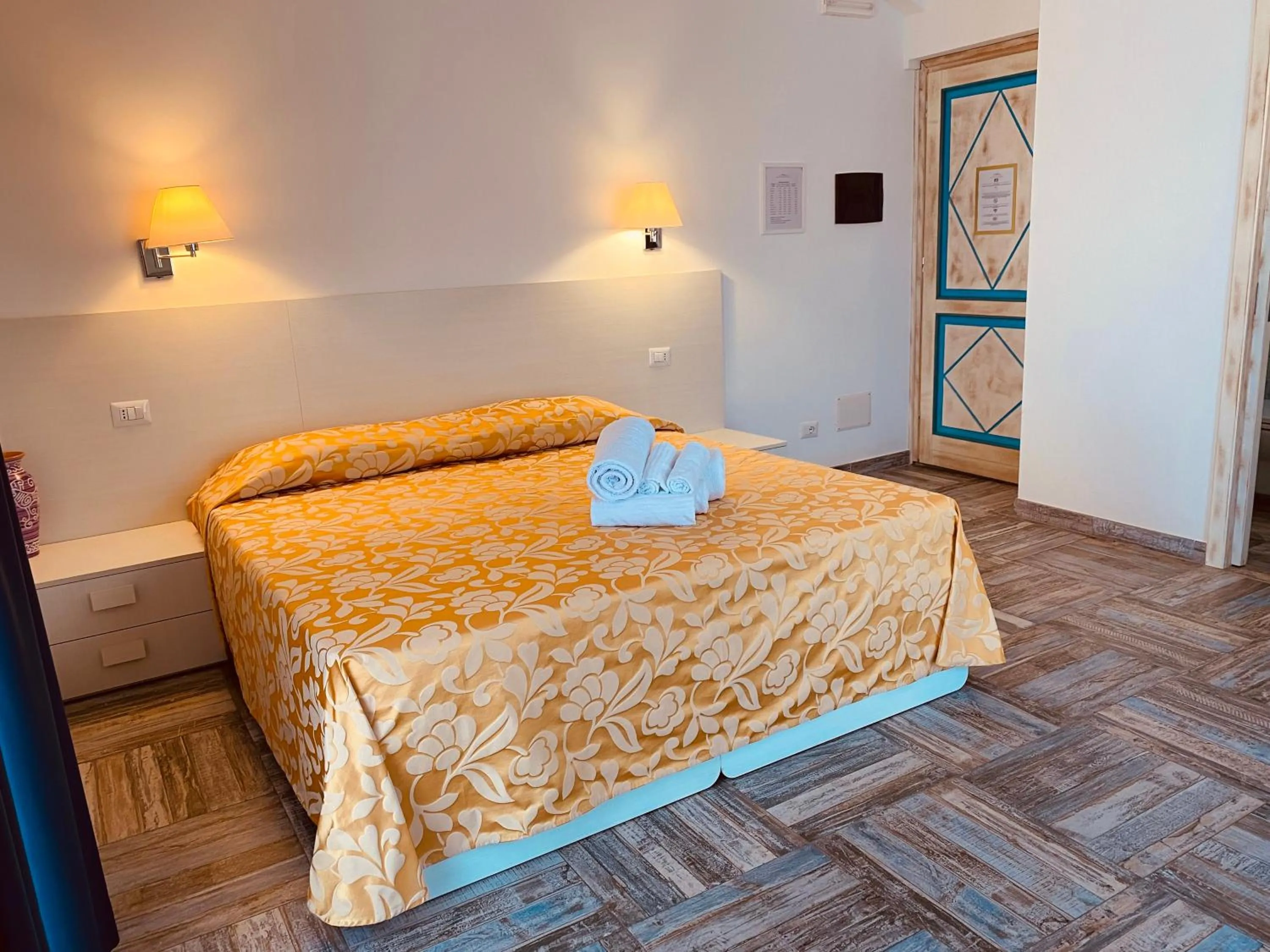 Bed in Hotel Muita di Mari