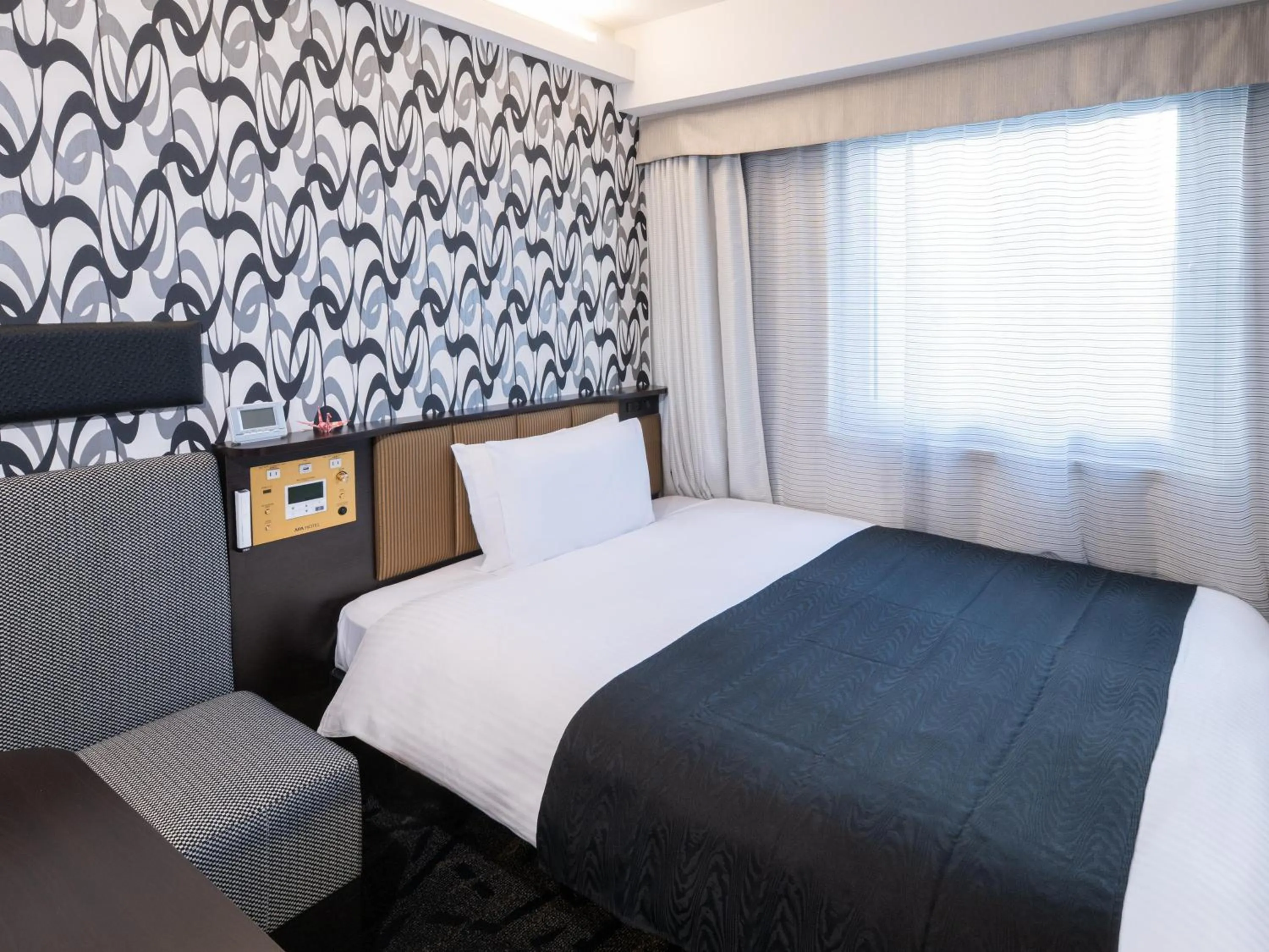 Photo of the whole room, Bed in APA Hotel Hatchobori Ekimae