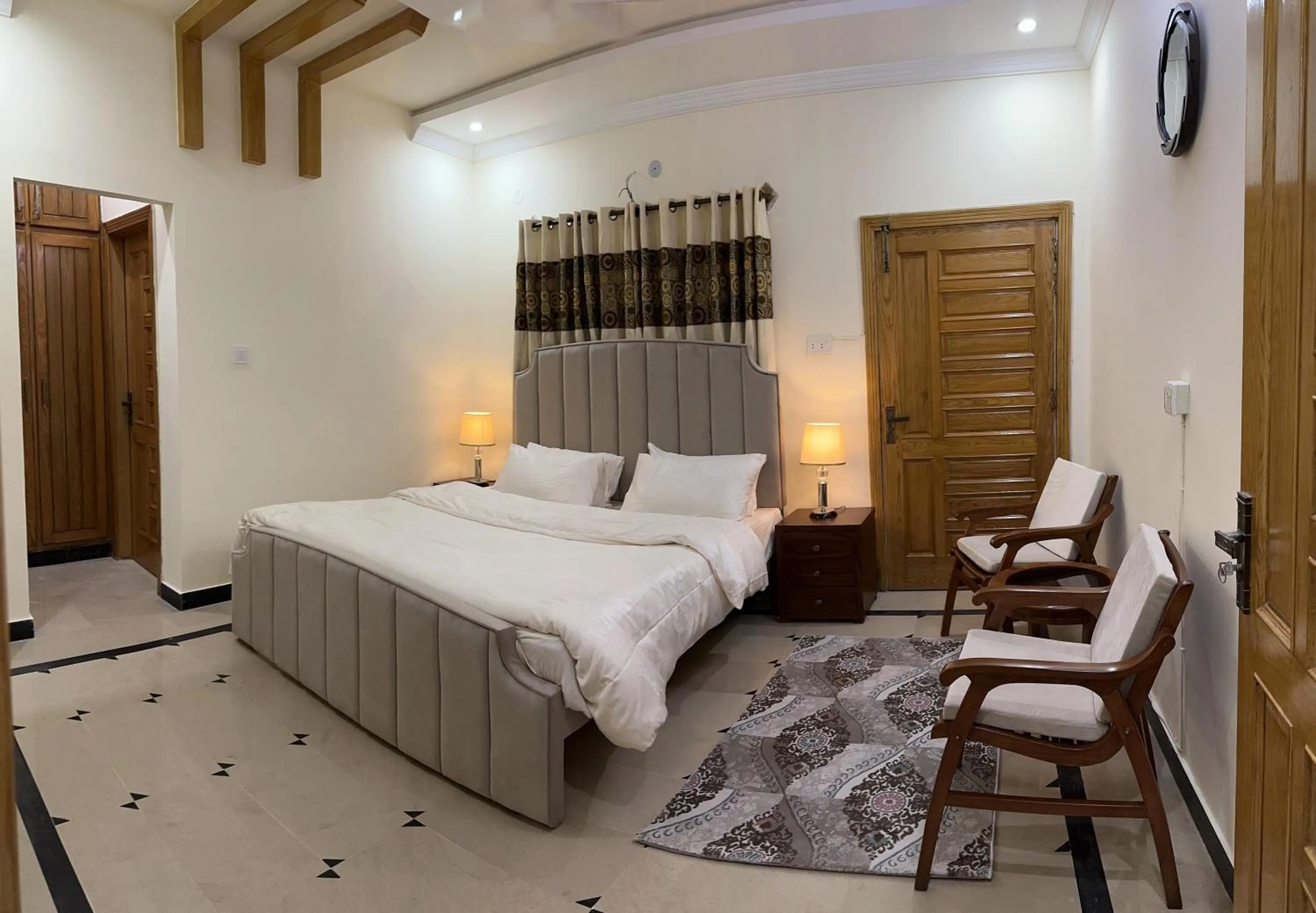 Bed in Roomi Guest House