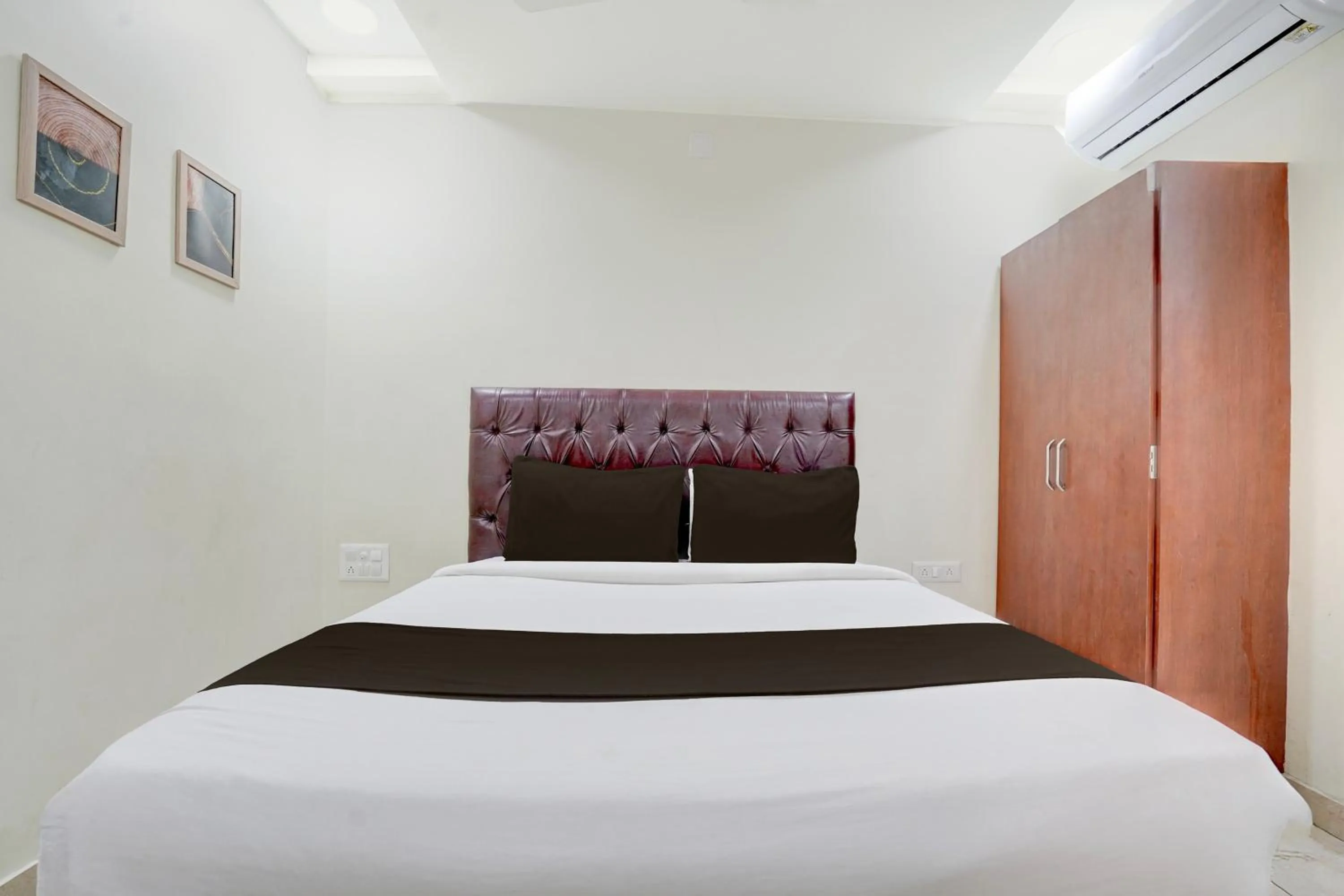 Bedroom, Bed in Hotel O Magunta Layout Nellore Formerly The Paradise Guest Inn