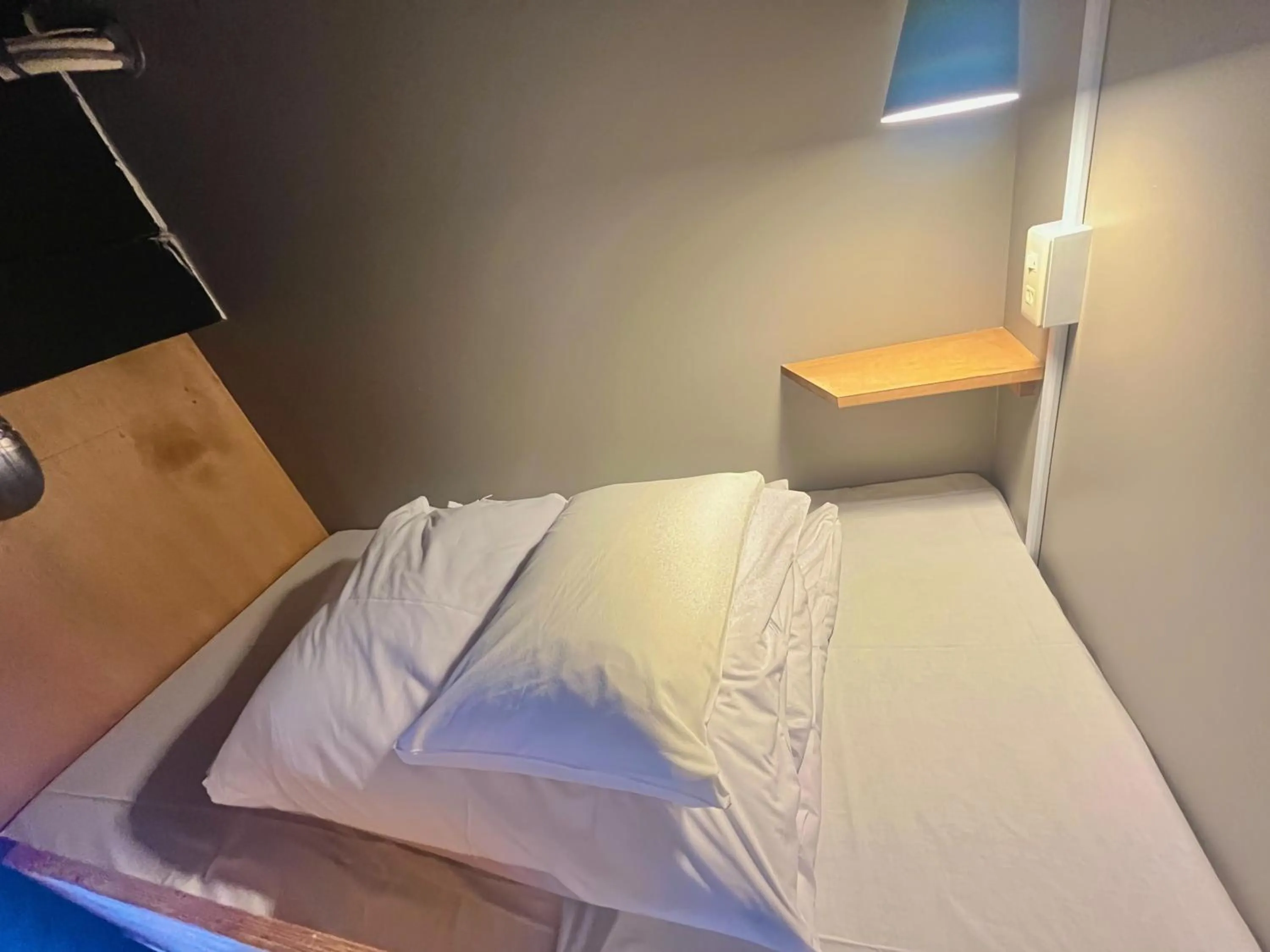 Bed in Wasabi Mita Hotel