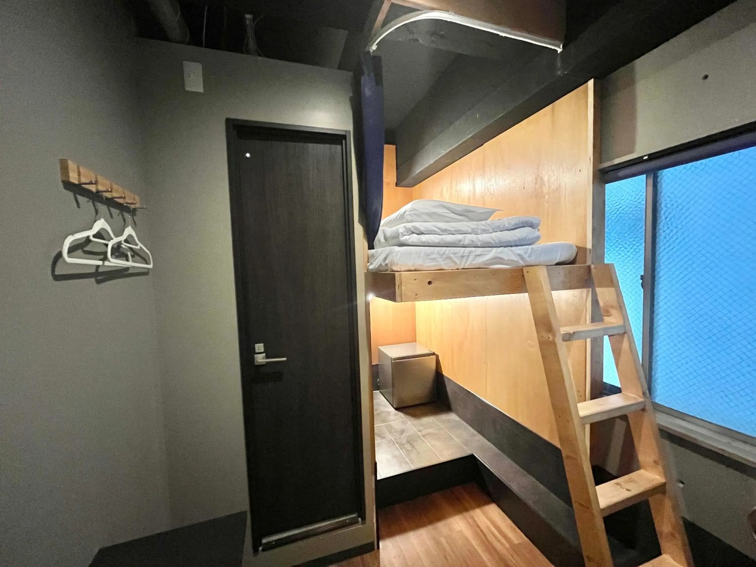 Bed in Wasabi Mita Hotel