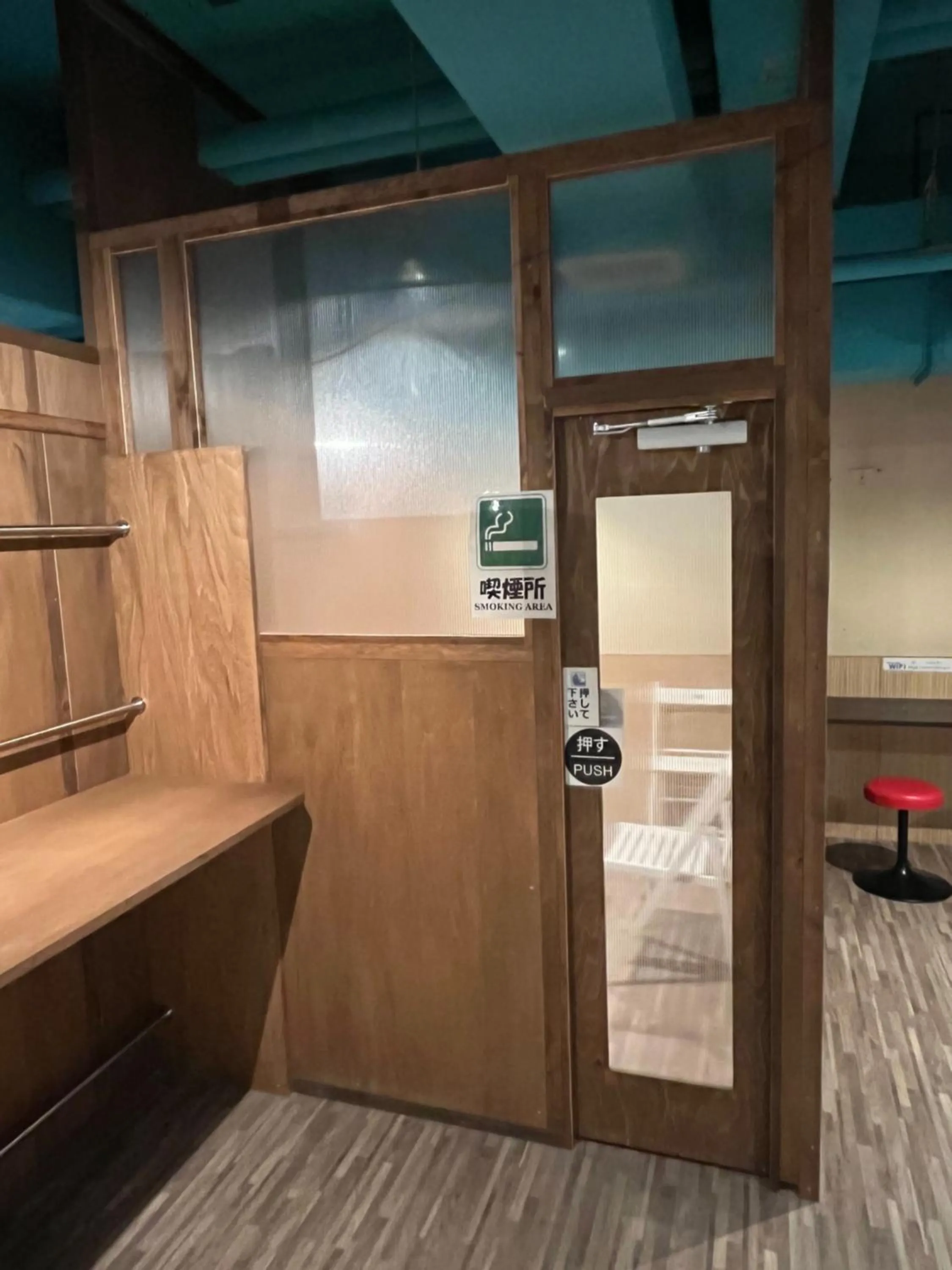 Communal lounge/ TV room in Wasabi Mita Hotel