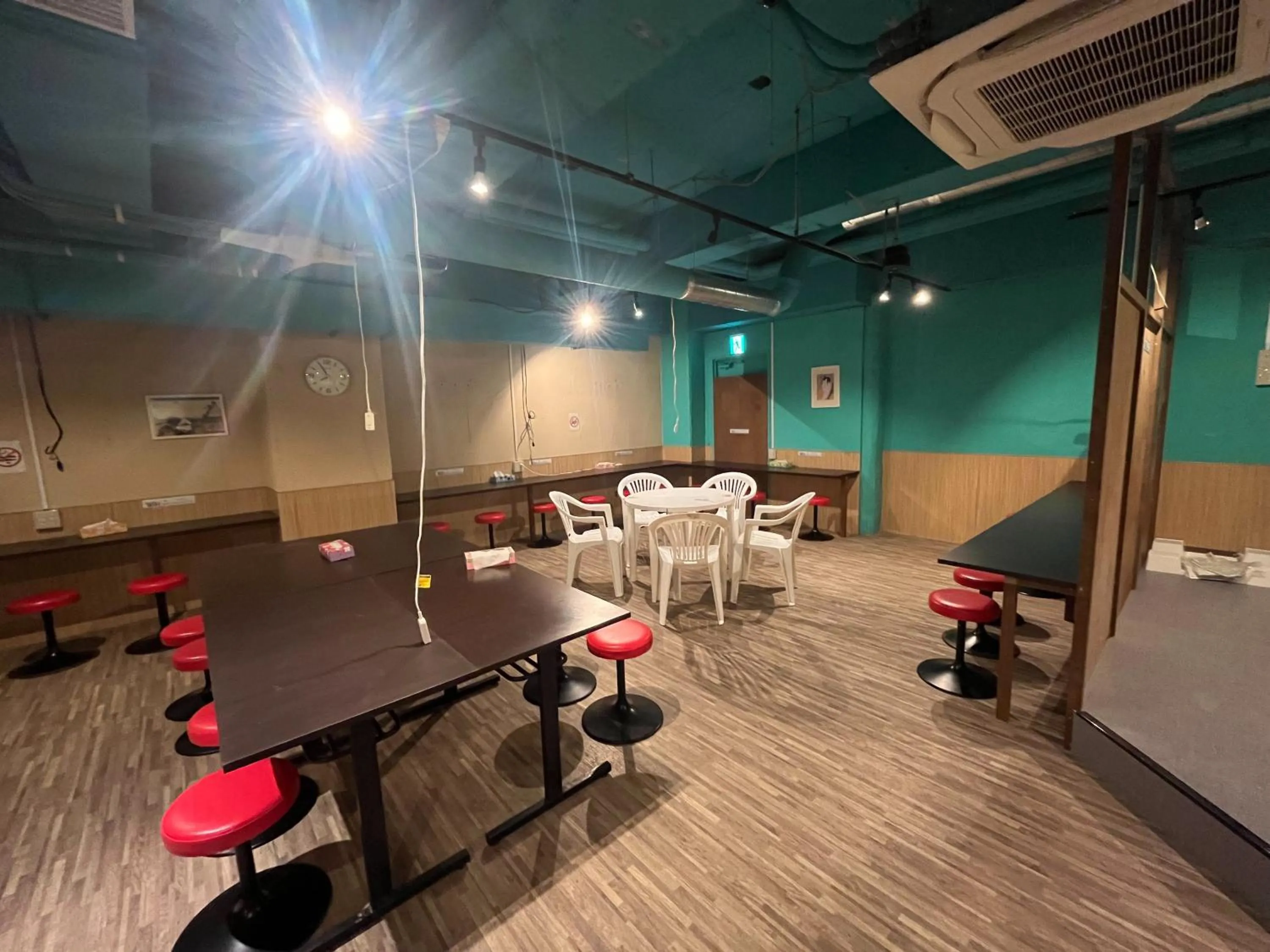 Communal lounge/ TV room in Wasabi Mita Hotel