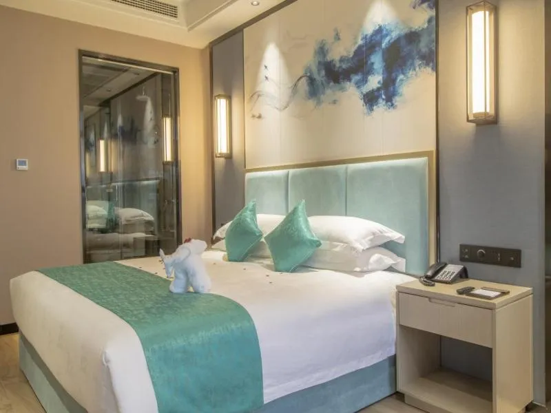 Bed in GreenTree Eastern Hotel Hainan Free Trade Port Jiangdong New District Meilan Airport