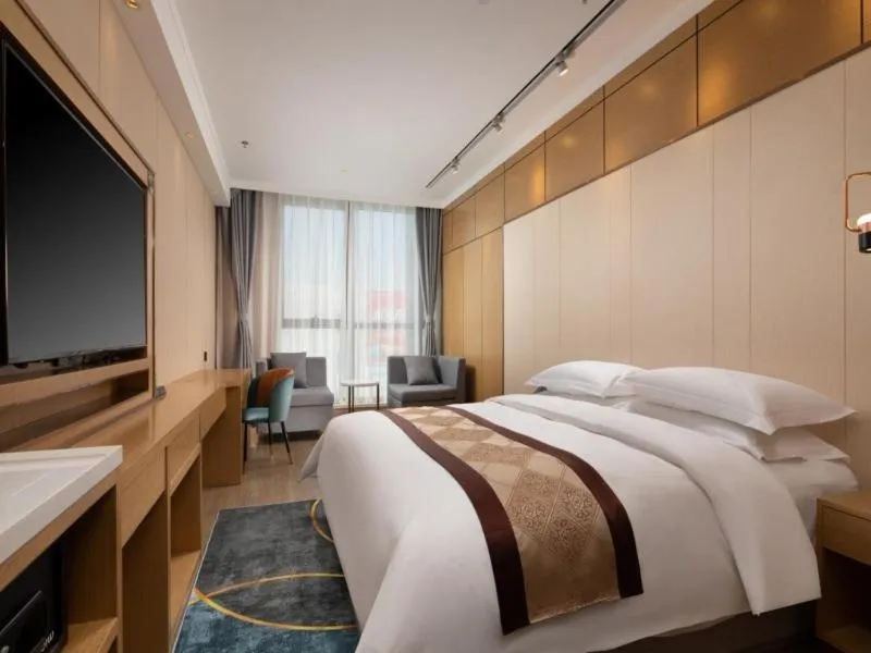 Bed in GreenTree Eastern Hotel Tianjin Wuqing Wanda Plaza