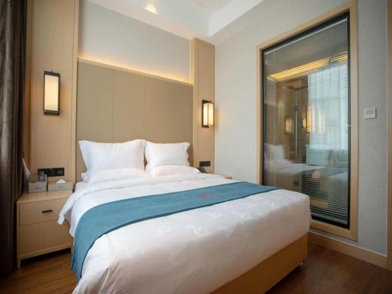 Bed in GreenTree Eastern Hotel Henan Anyang Hua County Wuzhou New Times Square