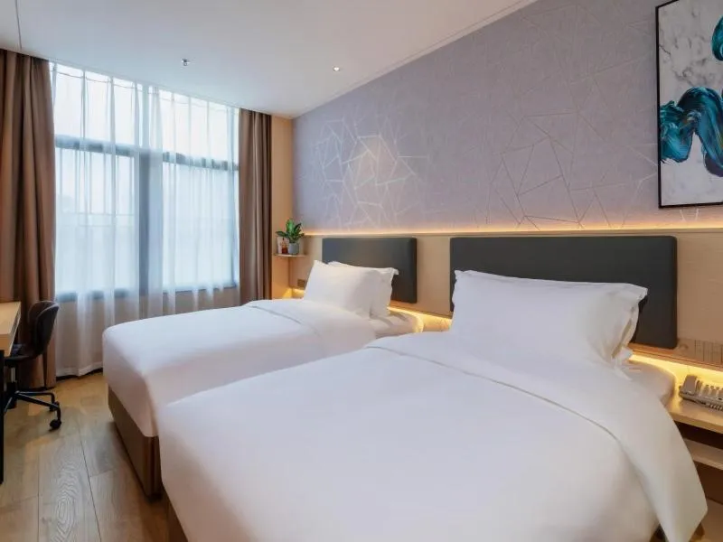 Bed in GreenTree Eastern Hotel Shenzhen Futian Civic Center Jingtan Subway Station