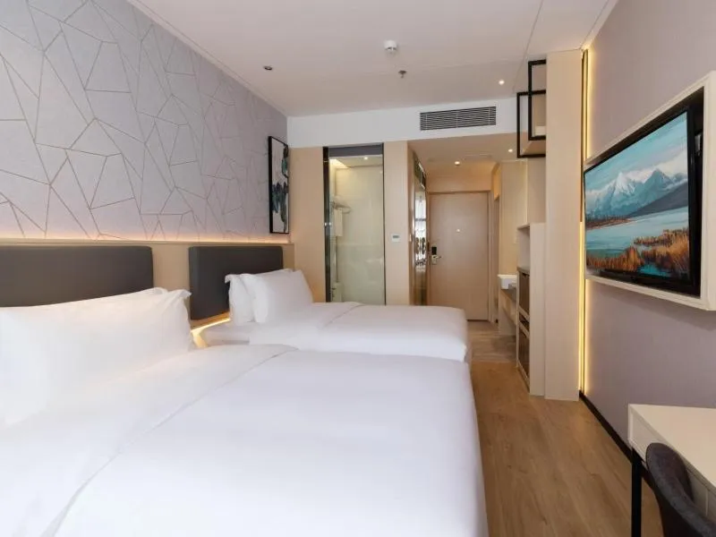 Bed in GreenTree Eastern Hotel Shenzhen Futian Civic Center Jingtan Subway Station