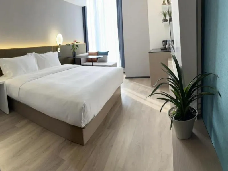 Bed in GreenTree Eastern Hotel Yiwu International Trade City