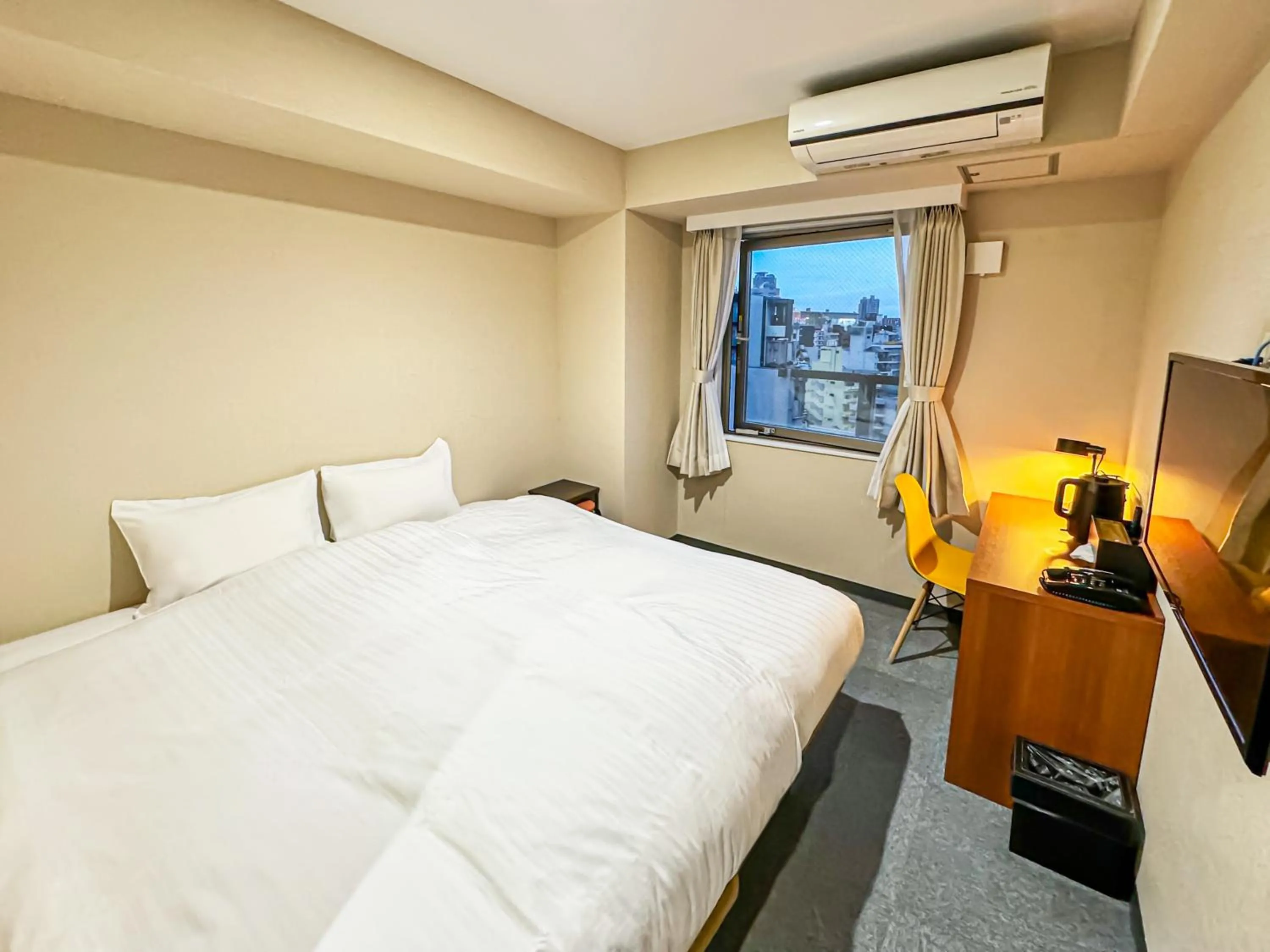 Photo of the whole room, Bed in CHECKinn Osaka Shinimamiya