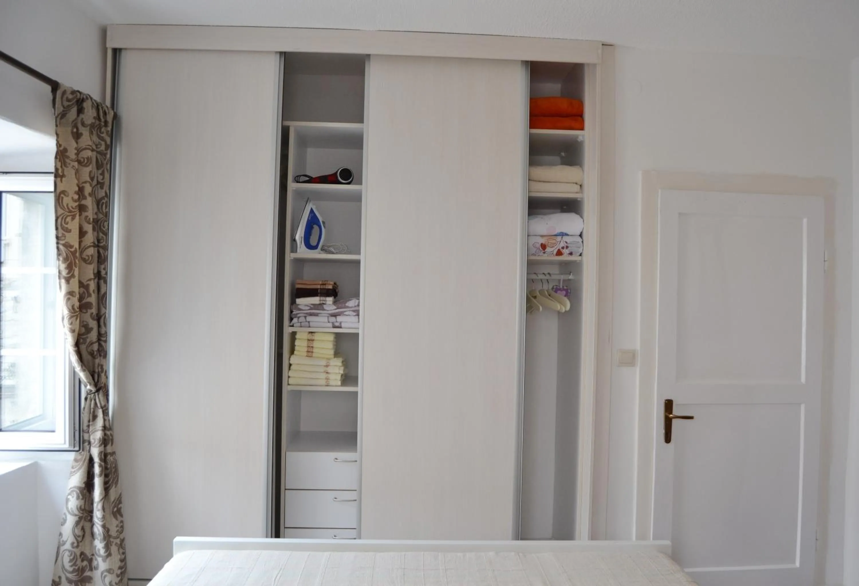 Bedroom in Bell Tower Apartment