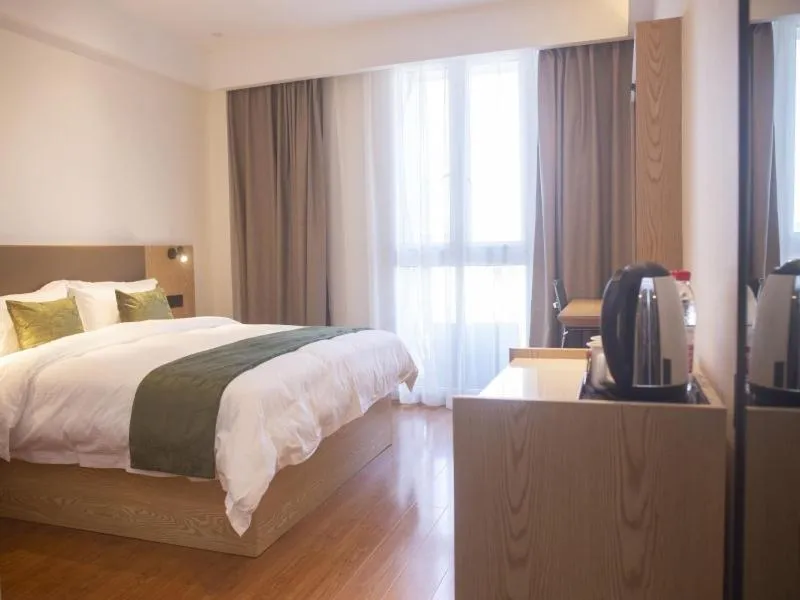 Bed in GreenTree Inn Express Hotel Jiangsu Suqian Shuyang Bus Station