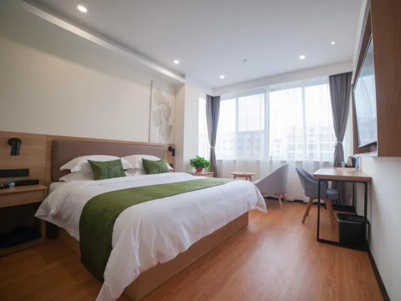Bed in GreenTree Inn Express Hotel Suzhou Zhangjianggang Free Trade Zone Central Plaza