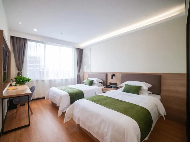 Bed in GreenTree Inn Express Hotel Suzhou Zhangjianggang Free Trade Zone Central Plaza