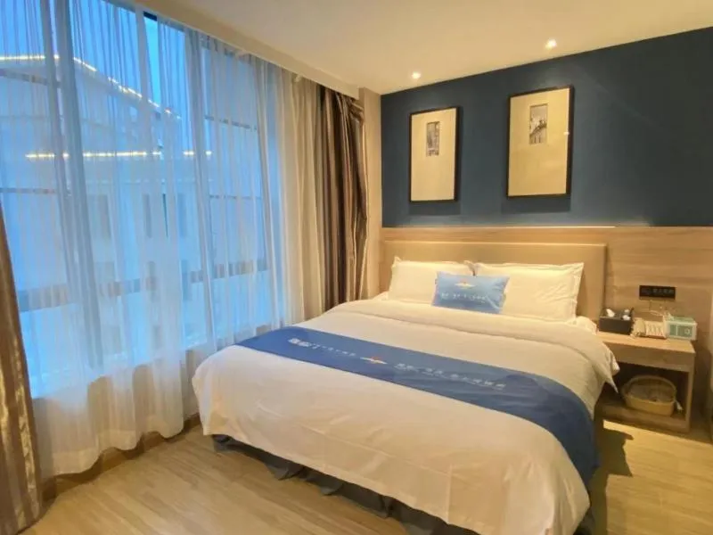 Bed in GreenTree Inn Shenzhen Buji Changlong Subway Station