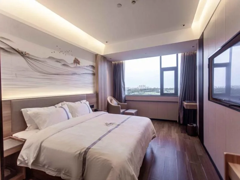 Bed in GreenTree Inn Shenzhen Buji Changlong Subway Station