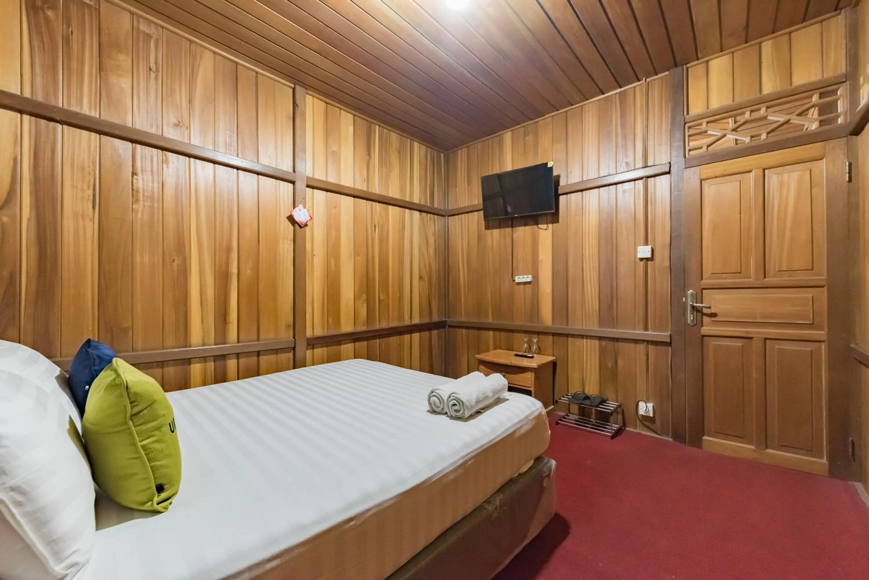 Bed in Urbanview Resort Anty Cisarua Tugu Puncak by RedDoorz