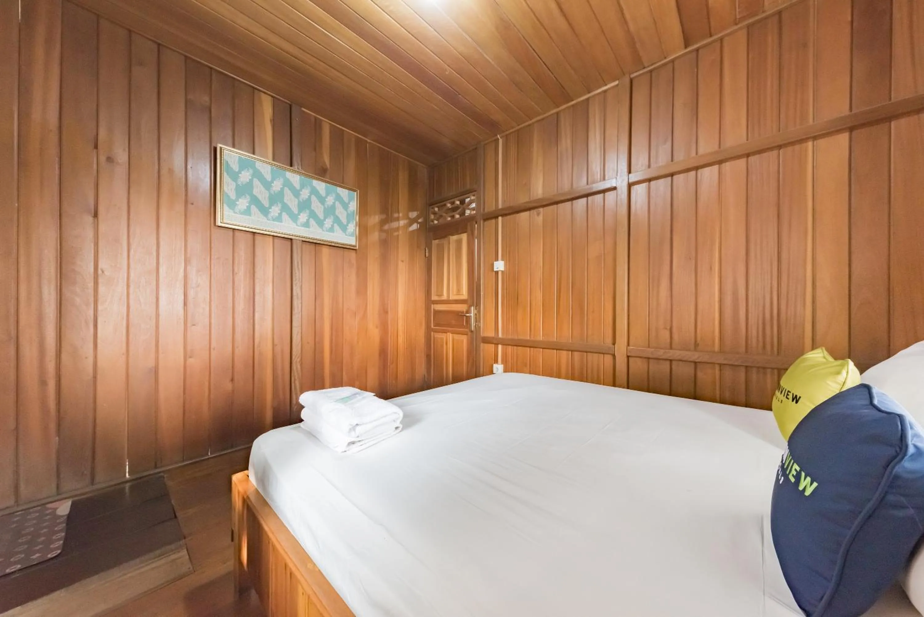 Bed in Urbanview Resort Anty Cisarua Tugu Puncak by RedDoorz