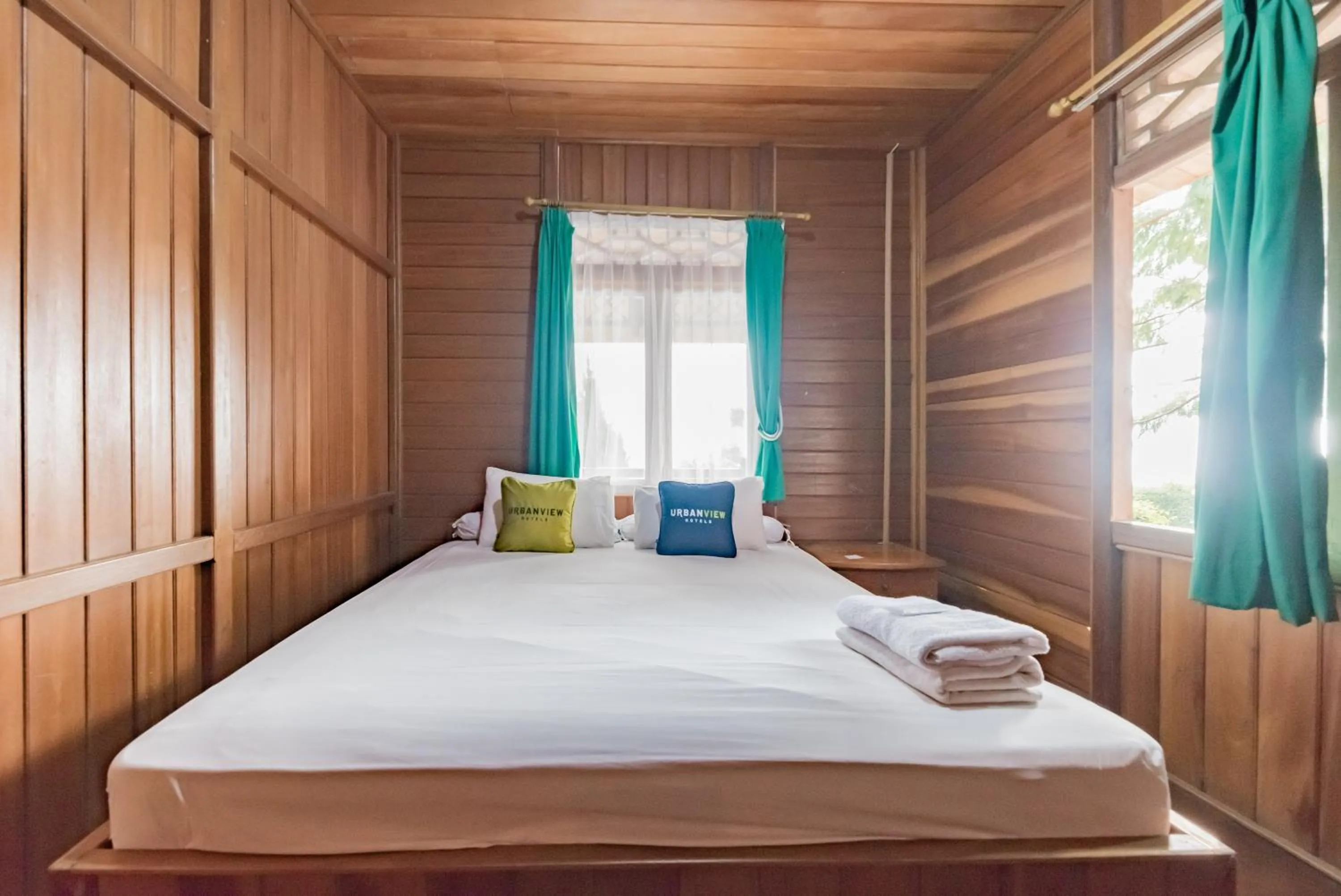 Bed in Urbanview Resort Anty Cisarua Tugu Puncak by RedDoorz