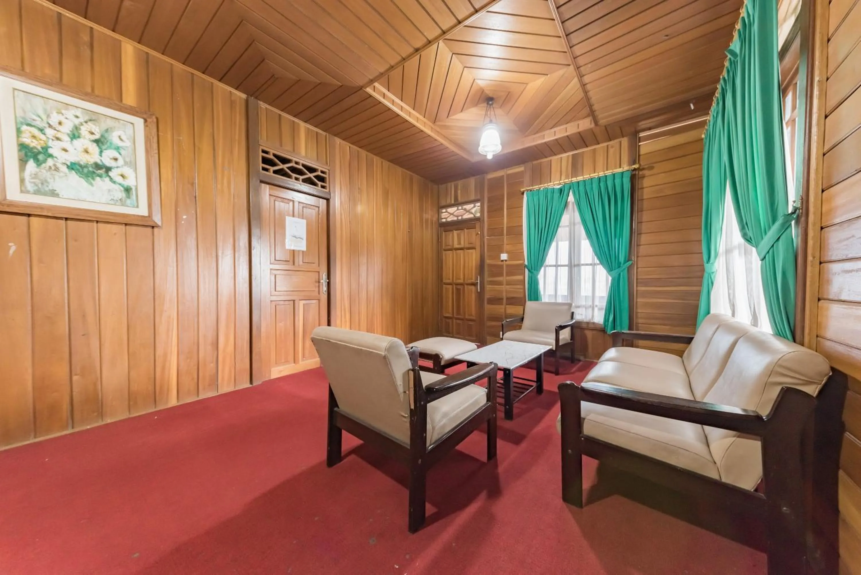 Living room in Urbanview Resort Anty Cisarua Tugu Puncak by RedDoorz