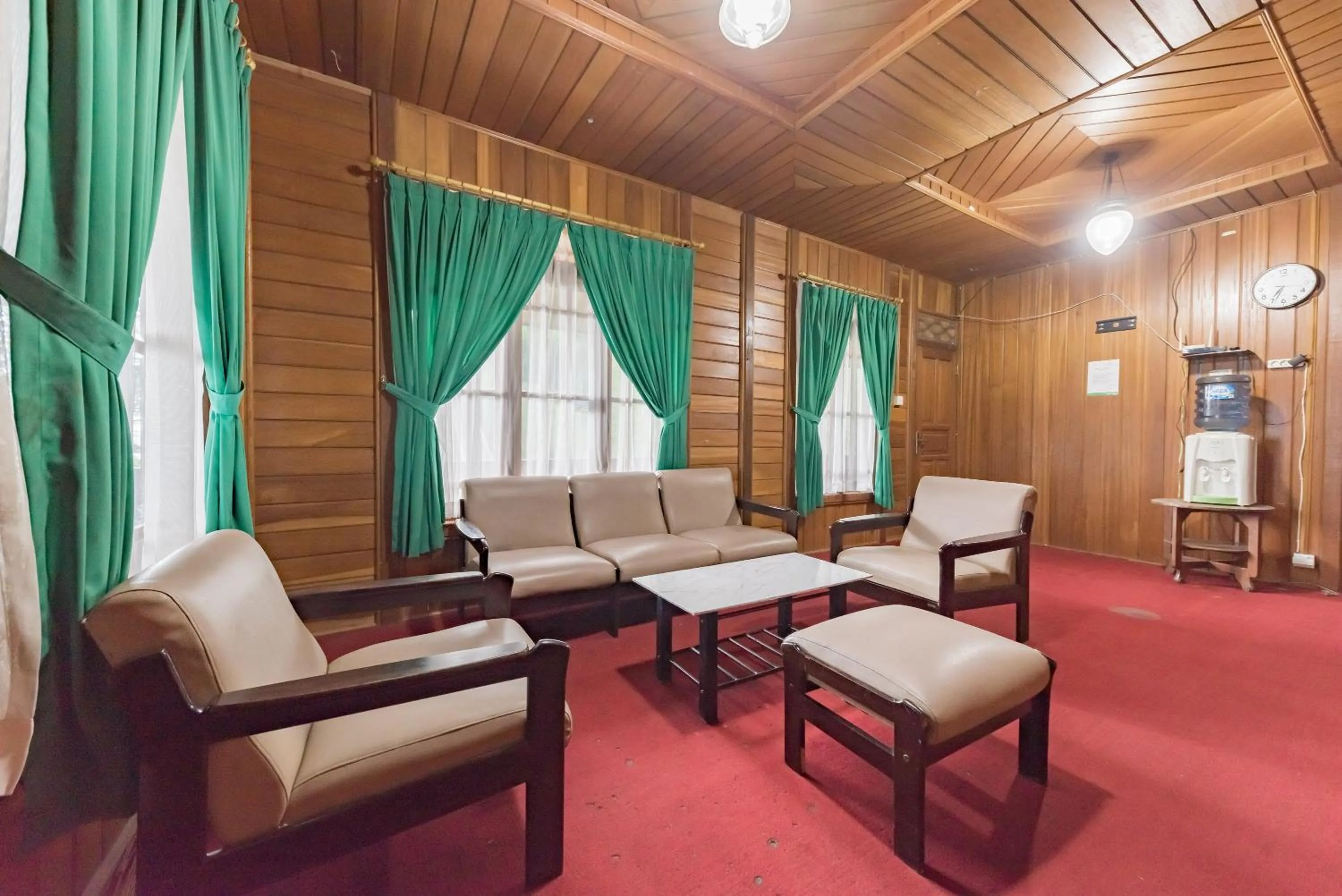 Living room in Urbanview Resort Anty Cisarua Tugu Puncak by RedDoorz