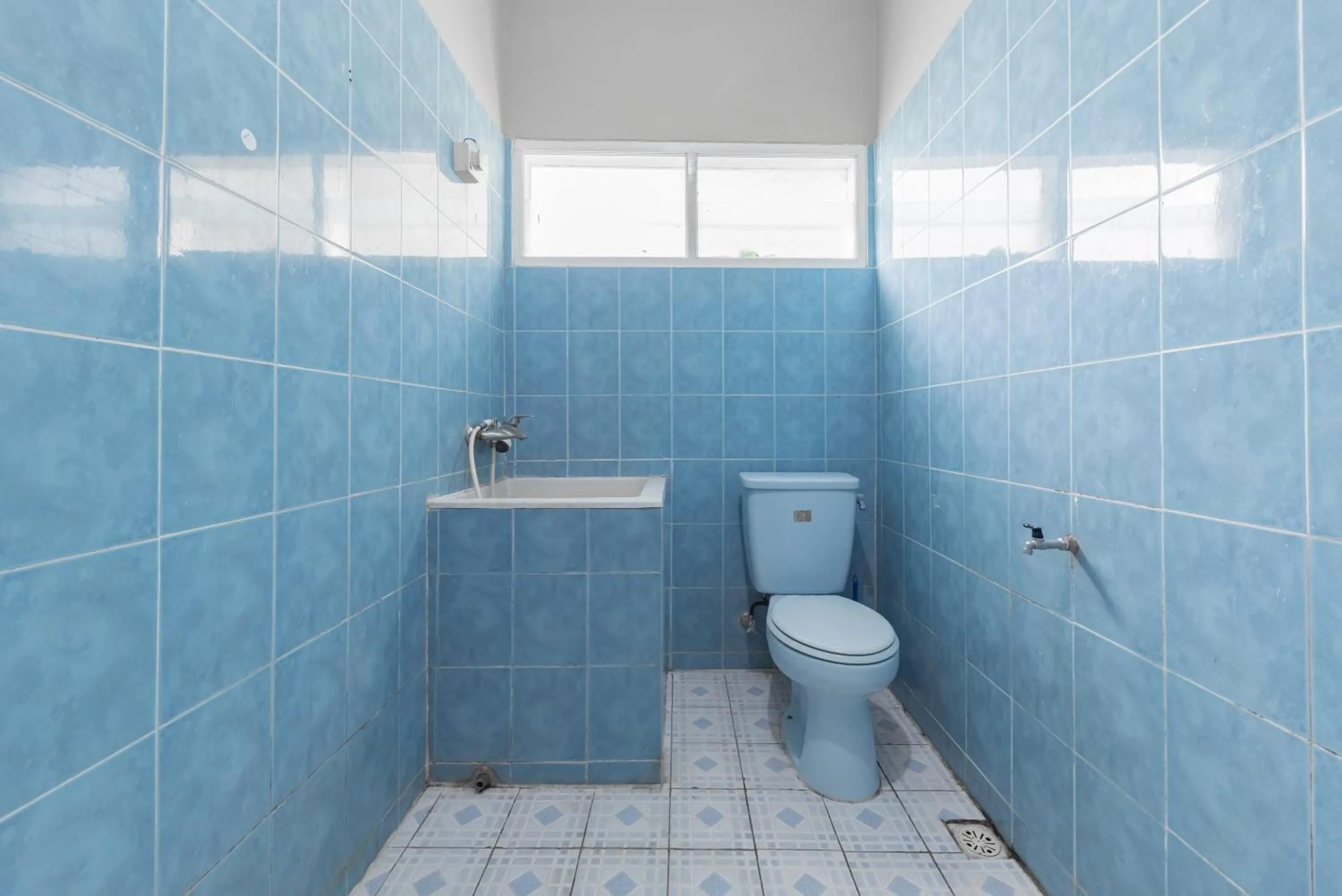 Bathroom in Urbanview Resort Anty Cisarua Tugu Puncak by RedDoorz