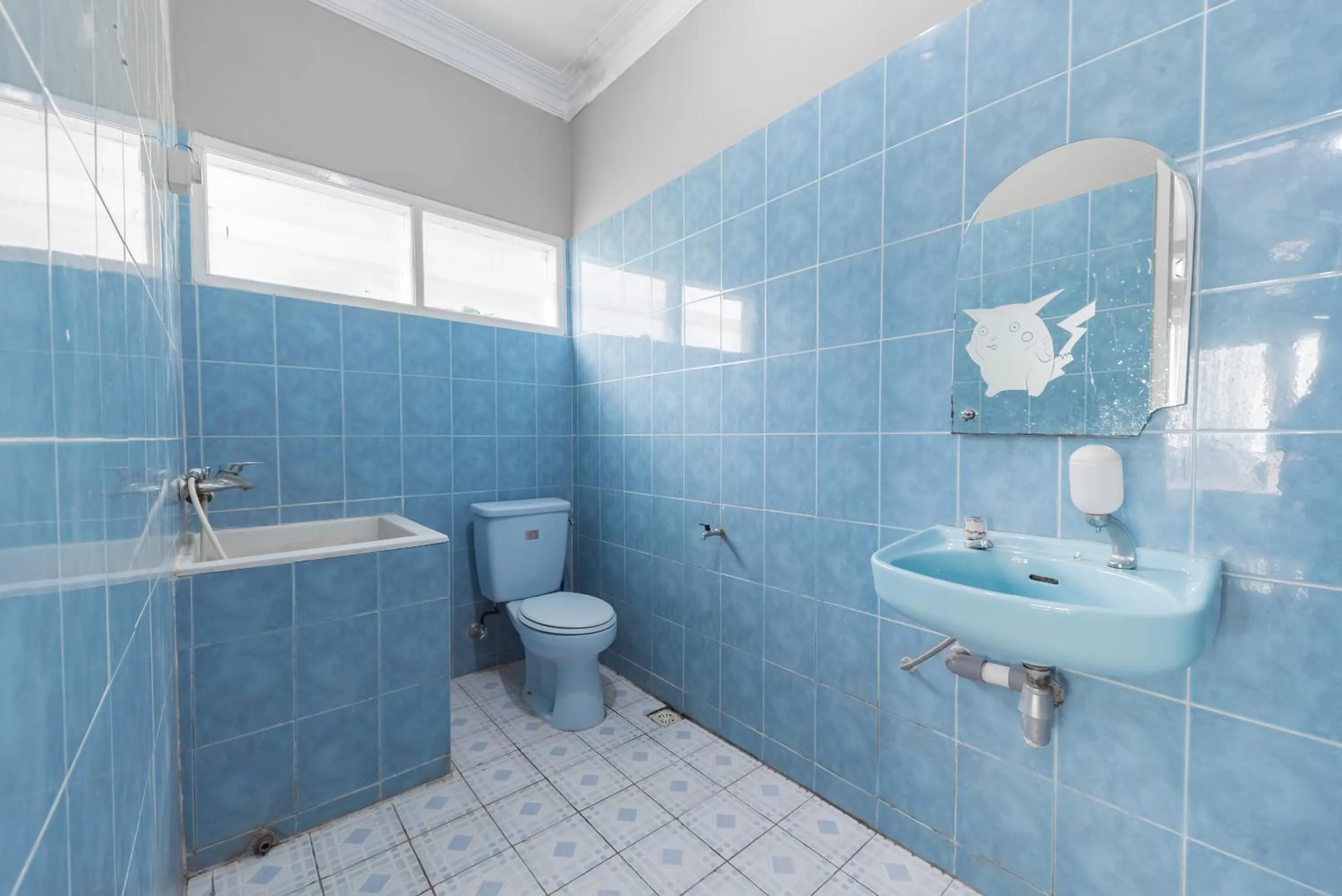 Bathroom in Urbanview Resort Anty Cisarua Tugu Puncak by RedDoorz