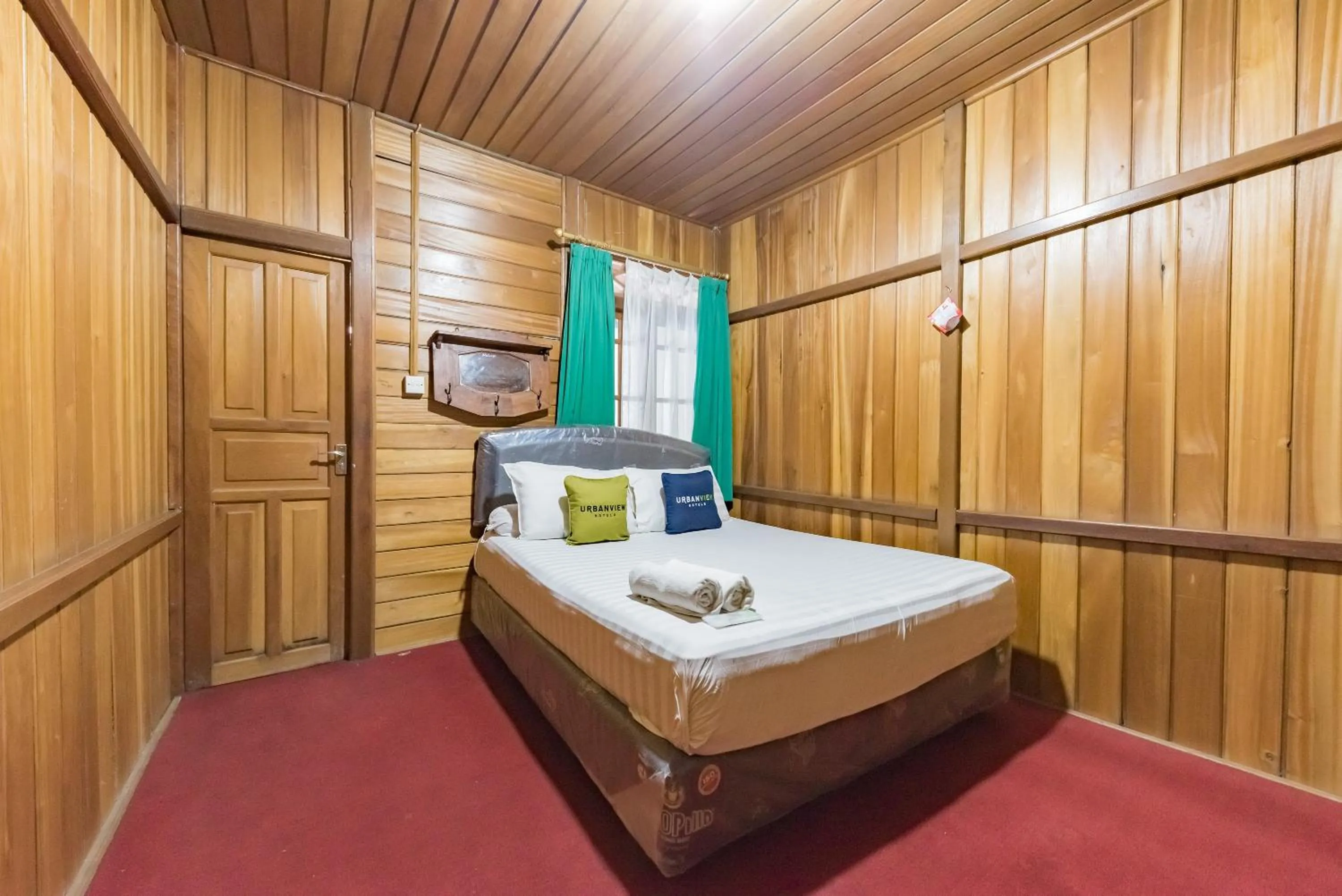 Bed in Urbanview Resort Anty Cisarua Tugu Puncak by RedDoorz